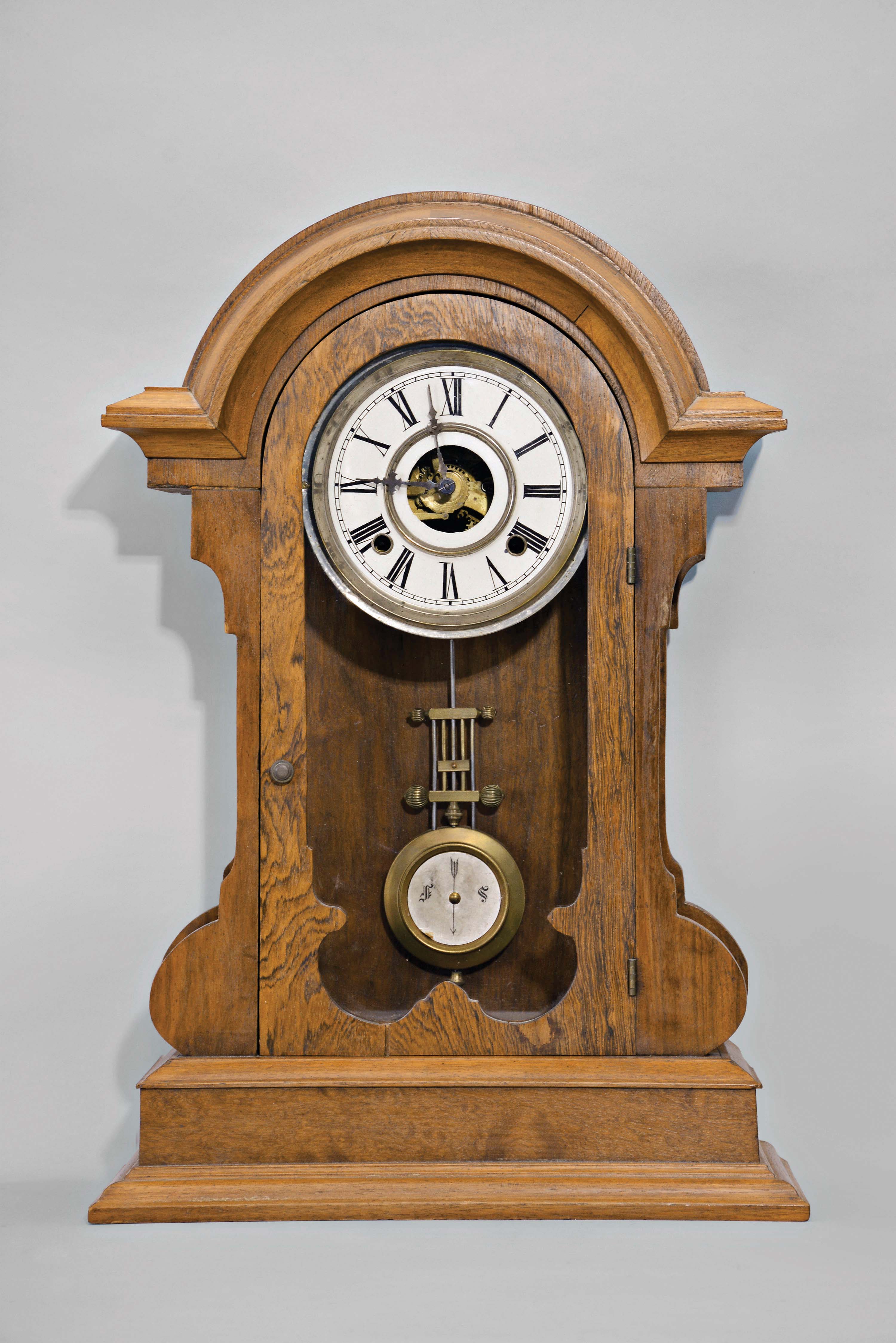George A. Jones, New York, "Egyptian", 8 day, time and strike, spring brass movement shelf clock. Model not marked, but a small advertisement shows another example that was sold at auction and identified as the "Egyptian". — Antique Clocks Price Guide