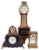 Clocks- 3 (Three) Time and Strike: (1) France, crystal regulator, 8 day, time and strike, spring-driven pendule de Paris movement with a visible Brocot escapement in a glazed brass case with white enamel dial with Roman numerals, c1910; (2) E. Ingraham, Bristol, Conn., "Nyanza" banjo clock, 8 day, time and strike, spring-driven movement in a mahogany case with white paper dial and large eagle finial, c1915; (3) Wm. L. Gilbert Clock Co., Winsted, CT "Curfew", 8 day, time and strike, spring-driven movement in a black enameled wood case with marbelized sides and prominent bell on top, c1910.