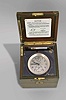 Hamilton Watch Co., Lancaster, Penn., model 21 marine Chronometer, 14 jewel, key wind and set fusee movement with straight line damascened nickel plates, spring detent escapement, large monometallic balance and helical balance spring, Arabic numeral metal dial with wind indicator, black painted steel spade and poker hands, with gimbaled brass bowl, contained in a three tier mahogany box with brass furniture, serial #2E10024