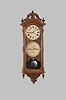 Ithaca Calendar Clock Co., Ithaca, New York, "No. 0 Bank", hanging 8 day, timepiece with perpetual calendar, weight driven movement in a walnut case with a carved pediment top, carved base and upper and lower finials with papered metal dials