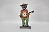 Bradley & Hubbard, Meriden, Conn., "Sambo" blinking eye shelf clock with a spring driven, 30 hour, timepiece with a balance wheel escapement in a painted cast iron case.
