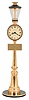 LeCoultre, Switzerland, "Rue de la Paix" desk or table clock, the turned, gilt, lamp post form case with 8 day, timepiece movement, Roman numeral white painted dial, and fancy blued steel hands, the Rue de la Paix sign professionally changed to read "Rue de la Schacker" for a previous owner