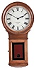 E. Howard & Co., Boston, Mass., "No. 70 Regulator" wall clock with a weight driven timepiece movement in an oak case.