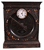 Syracuse Time Recorder Co., Syracuse, New York, time recorder, 8 day, time and recorder function, twin-spring pendulum movement in a heavy cast iron case with embossed copper front, having a white porcelain dial signed by Seth Thomas, all atop the cast base with the name of the compaNew York and 1904 patent dates.
