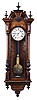 Lenzkirch Clock Co., Lenzkirch, Germany, Vienna style wall clock, 8 day, time only, brass weight driven movement in a burled walnut carved case with ebonized highlights, white enamel dial and subsidiary seconds, serial #552447