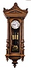 Ludwig Leeb, Horn, Germany, Vienna regulator wall clock, 8 day, time, strike and grande sonnerie with pull repeat, weight driven movement in a carved walnut Altdeutsch case with ebonized accents and white enamel dial