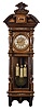 Germany, Vienna regulator wall clock, 8 day, time, strike and grand sonnerie, weight driven movement in a walnut case with brass ornamentation, silvered chapter ring, matching engraved dial center, weights and pendulum disc