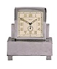 Renova, Switzerland, a nickel plated, musical alarm clock in a rectilinear case with Arabic numeral metal dial, blued steel luminous baton hands, 30 hour, timepiece movement with music box concealed in the base