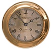 Chelsea Clock Co., Boston, Mass., marine clock, 8 day, time and ship's strike, spring driven jeweled balance wheel movement in a brass case with screw-on bezel and 5.5 inch silvered dial with blued steel Breguet style hands.