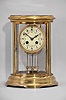 French, Marti & Cie, 8 day, time and strike, spring brass movement oval case crystal regulator mantel clock.