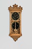 Ithaca Calendar Clock Co., Ithaca, New York, "No. 5 1/2, Hanging Belgrade" wall clock with an E. N. Welch spring driven, 8 day, time and strike movement and an H. B. Horton patented perpetual calendar mechanism in an ash case.