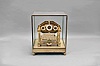 Emperor Clock Co. Ltd., London, a reproduction Congreve rolling ball timepiece, fusee movement with separate dials for minutes, hours and seconds, the plates supported by four turned columns, all resting on ball feet, the tray with zig zag path for the steel ball "oscillator" suspended below the movement, and with rectangular base, spherical leveling feet, and conforming glass dome, serial #053 from an edition of 250.