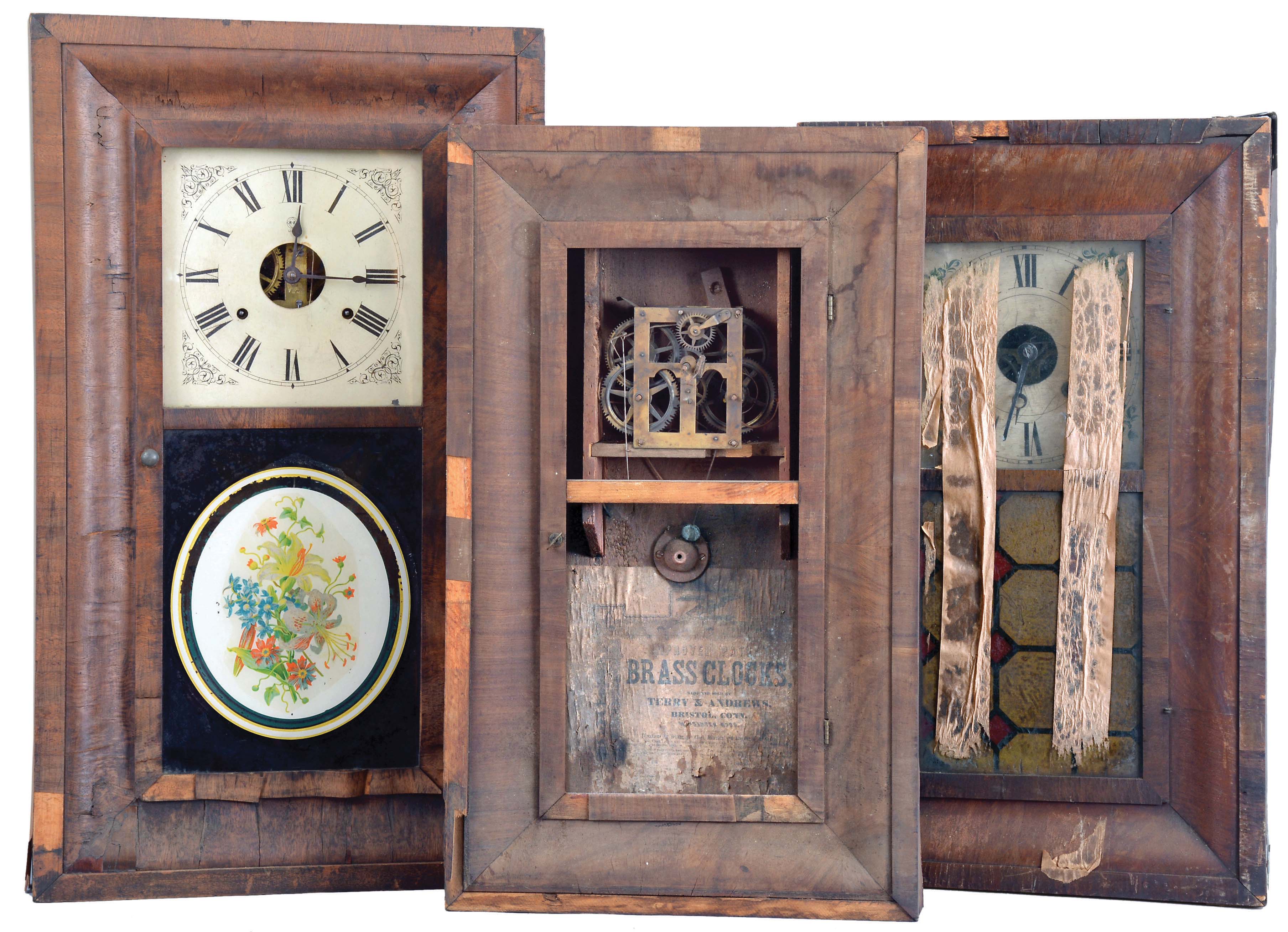 Clocks- 8 (Eight): (1) Union Manufacturing Co., Bristol, Conn., 30 hour, time and strike, weight brass movement OG shelf clock, c1850; (2) New Haven Clock Co., New Haven, Conn., 30 hour, time and strike, weight brass movement OG shelf clock, c1870. (3) Sperry & Shaw, New York, 30 hour, time and strike, weight brass movement OG shelf clock, c1845. (4) Chauncey Boardman, Bristol, Conn., 30 hour, time and strike, weight brass movement OG shelf clock, c1850 (5) Seth Thomas Clock Co., Thomaston, Conn., 8 day, time and strike, weight brass movement OG shelf clock, c1870. (6) Ansonia Brass Co., Ansonia, Conn., 8 day, time, strike and alarm weight brass movement OG shelf clock, c1860. (7) Smith Brothers, New York, 30 hour, time and strike, weight brass movement OG shelf clock, c1850 (8) Terry & Andrews, Bristol, Conn., 30 hour, time and strike, weight brass movement OG shelf clock, c1850 — Antique Clocks Price Guide