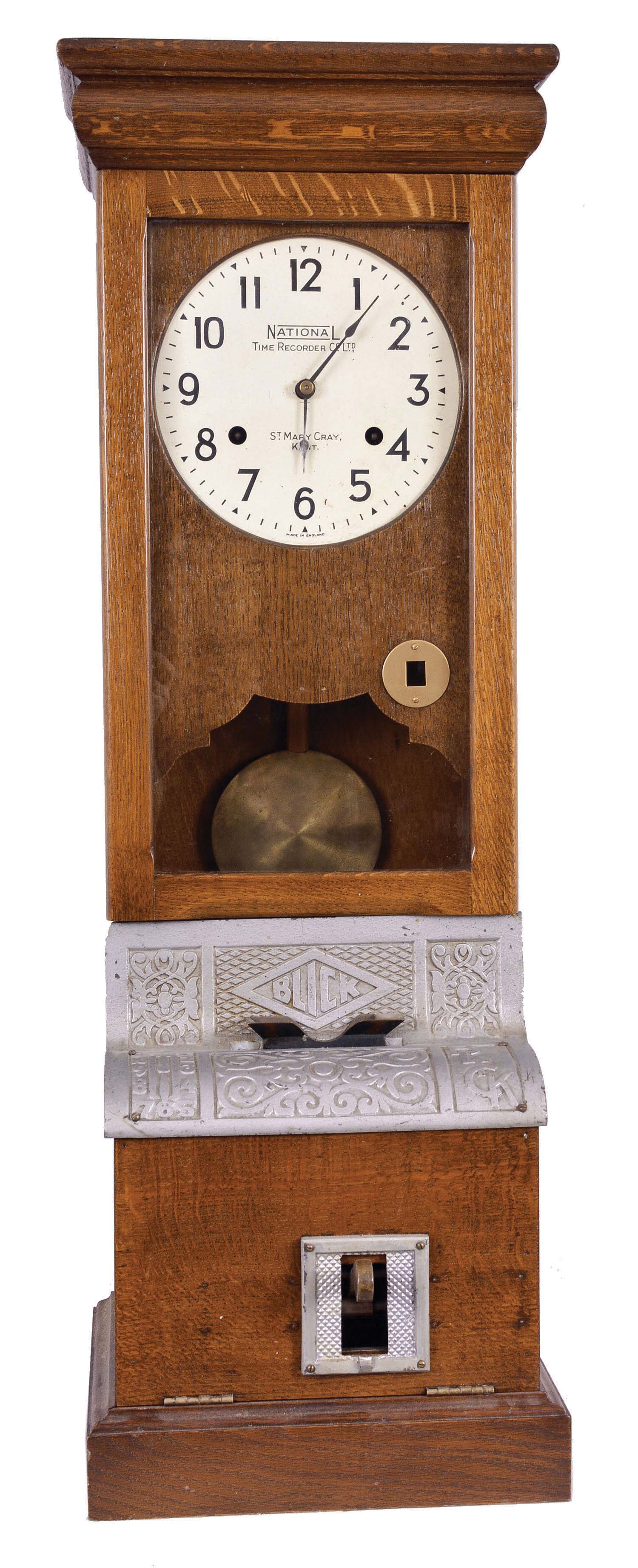 Clocks- 2 (Two) Time Recorders: (1) National Time Recorder Co. Ltd., St. Mary Cray, Kent., time recorder, 8 day, time and punch card, twin spring movement in an oak case with ornate casting in the middle reading "Blick "; (2) Simplex Time Recording Co., Gardner, Mass., hanging timepiece, 8 day, time only, twin spring movement in an oak case. — Antique Clocks Price Guide