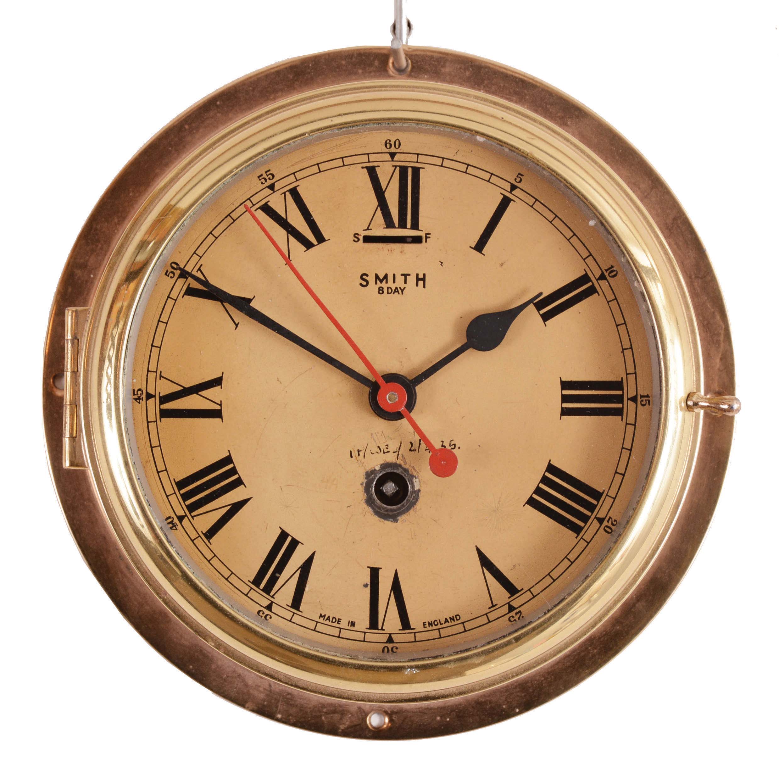 Clocks- 4 (Four): (1) Germany, 30 hour, weight brass movement cuckoo and quail wall clock, c1920 (2) English, 8 day, time and strike, spring brass lever movement gallery clock, c1935 (3) Unknown, American, 30 hour, time and alarm spring brass lever small gallery timepiece, c1865 (4) Smith, England, "Astral", 8 day, spring brass lever movement engine or ward room wall timepiece, c1935 — Antique Clocks Price Guide