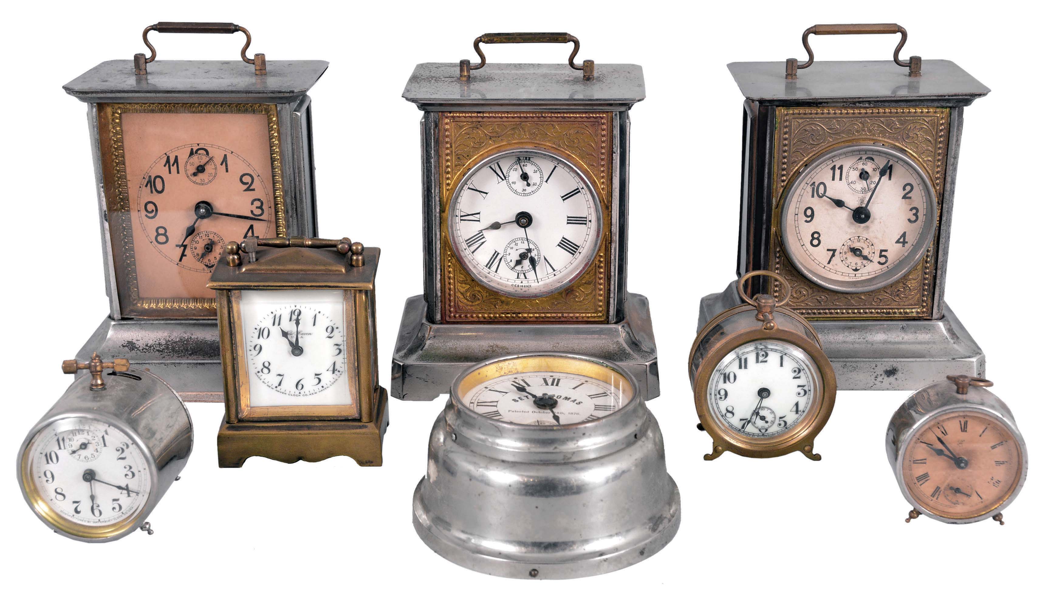 Clocks- 8 (Eight) Novelty and Musical Alarm Clocks: Clocks include models by Seth Thomas, New Haven, Waterbury, Sprague & Co., and Junghans. Standouts include a Waterbury "Hornet" 30 hour novelty timepiece and a small repeating "Kenwick" carriage clock by New Haven. — Antique Clocks Price Guide