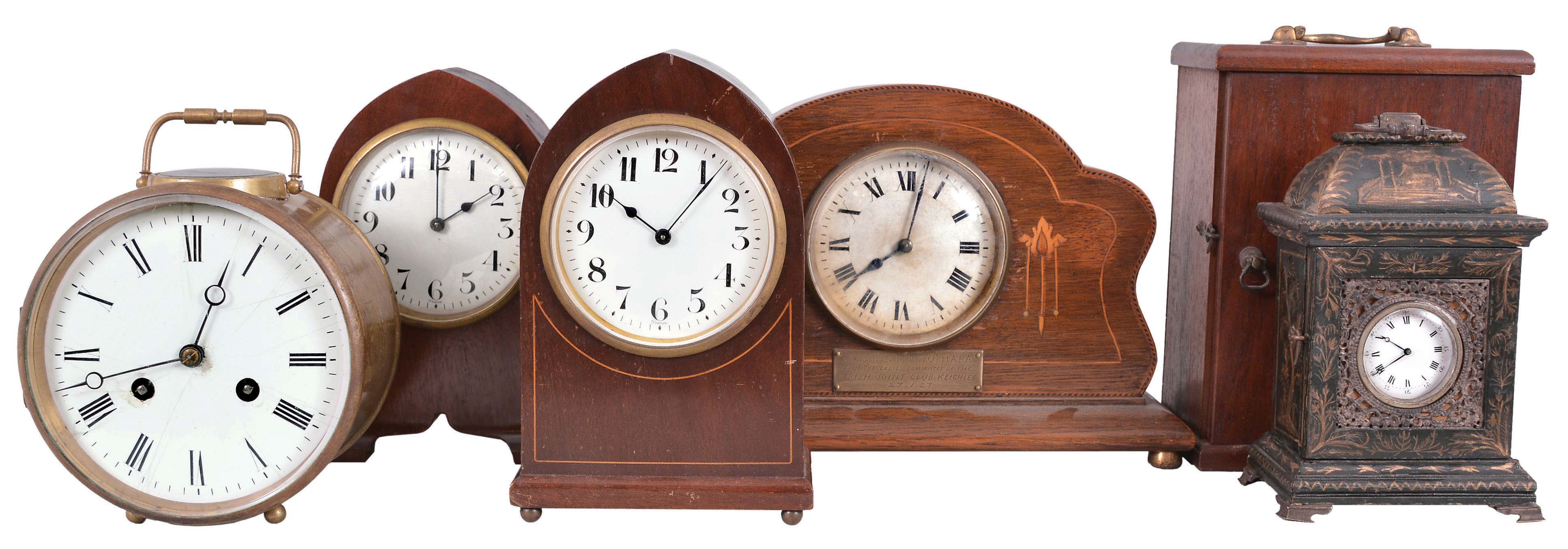 Clocks- 5 (Five) French Mantel and Shelf: All clocks with balance wheel movements, four time only in wood cases, some with inlay and one time and strike in a brass case with a white enamel dial. Miniature bracket clock may be Swiss and comes in a custom wooden carrying case. Makers and retailers include Japy Freres, H & H, Duverdrey & Bloquel, and others. — Antique Clocks Price Guide