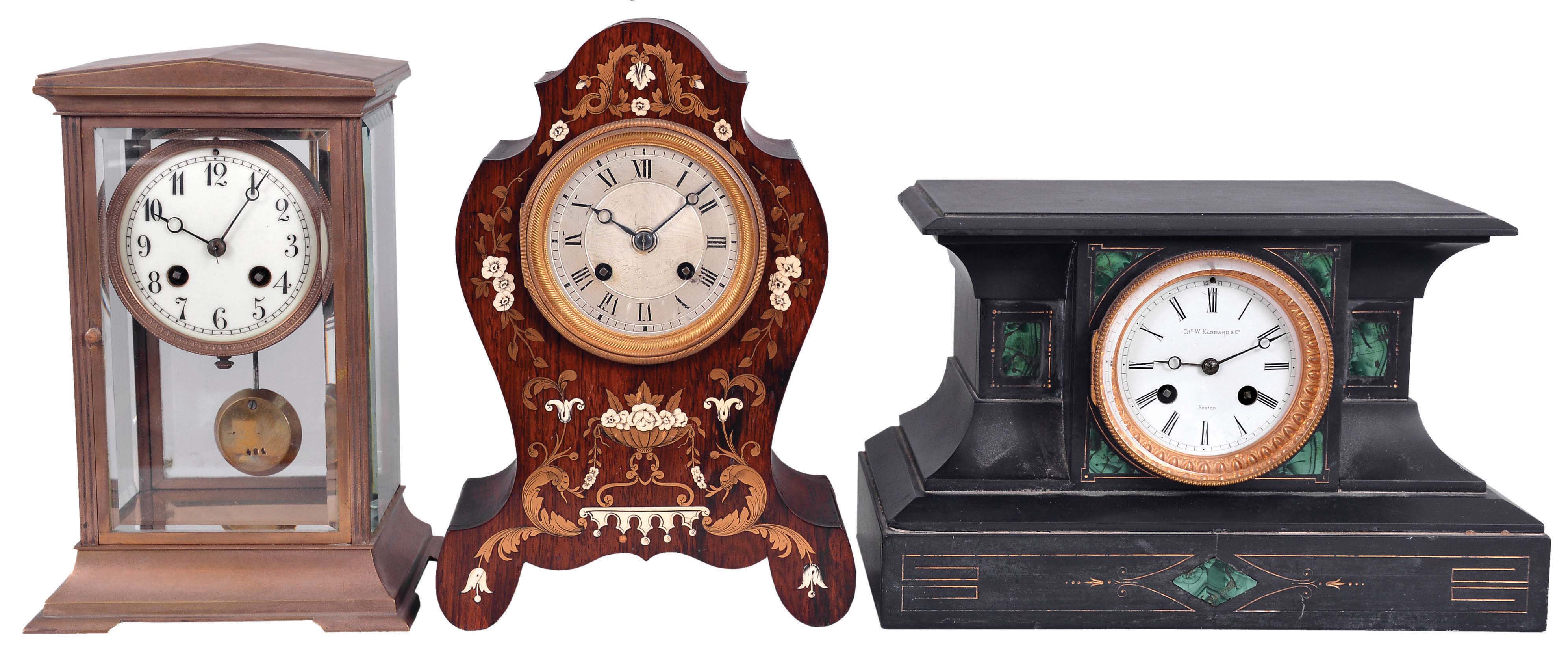 Clocks- 3 (Three) French Mantel Clocks: (1) W.B. Promoli, Paris, mantel clock, 8 day, time and strike, spring-driven movement with silk thread suspension in a rosewood case with floral boulle work, the engine turned silvered dial is signed by the maker; (2) S. Marti et Cie., Paris, crystal regulator, 8 day, time and strike, spring-driven movement in a brass and glass case with white porcelain dial; (3) S. Marti et Cie., Paris for Chas. W. Kennard & Co., Boston, mantel clock, 8 day, time and strike, spring-driven pendule de Paris movement in a black slate case with green malachite insets and white enamel dial. — Antique Clocks Price Guide
