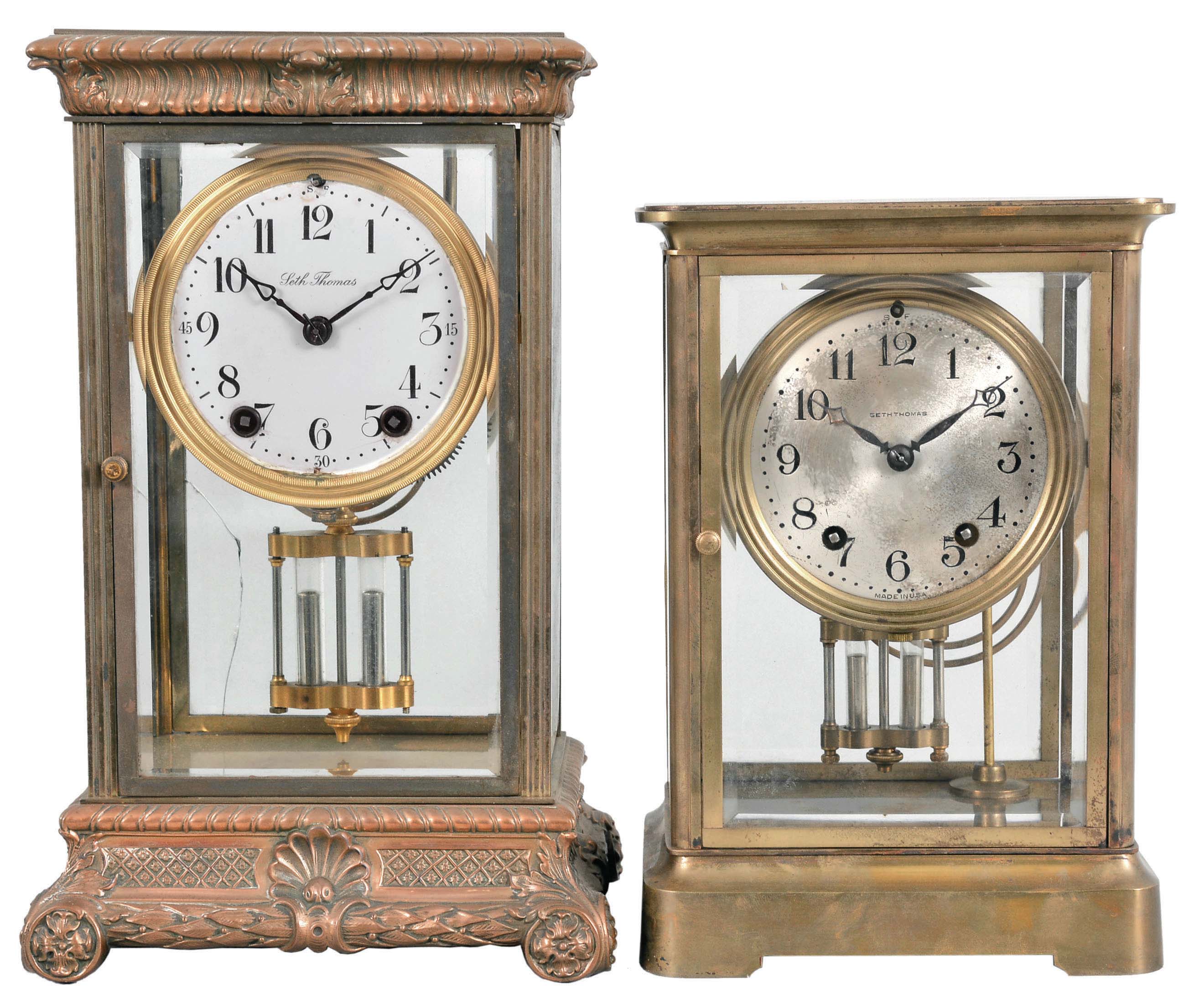 Clocks- 2 (Two ) Crystal Regulators: (1) Seth Thomas, Thomaston, Conn., "Empire No. 13" crystal regulator, 8 day, time and strike, spring-driven round movement in a glazed brass case with white enamel dial and double-vial pendulum, c1907; (2) Seth Thomas, Thomaston, Conn., "Empire no. 200" crystal regulator, 8 day, time and strike, spring-driven round movement in a glazed brass case with silvered dial and double-vial pendulum, c1928. — Antique Clocks Price Guide