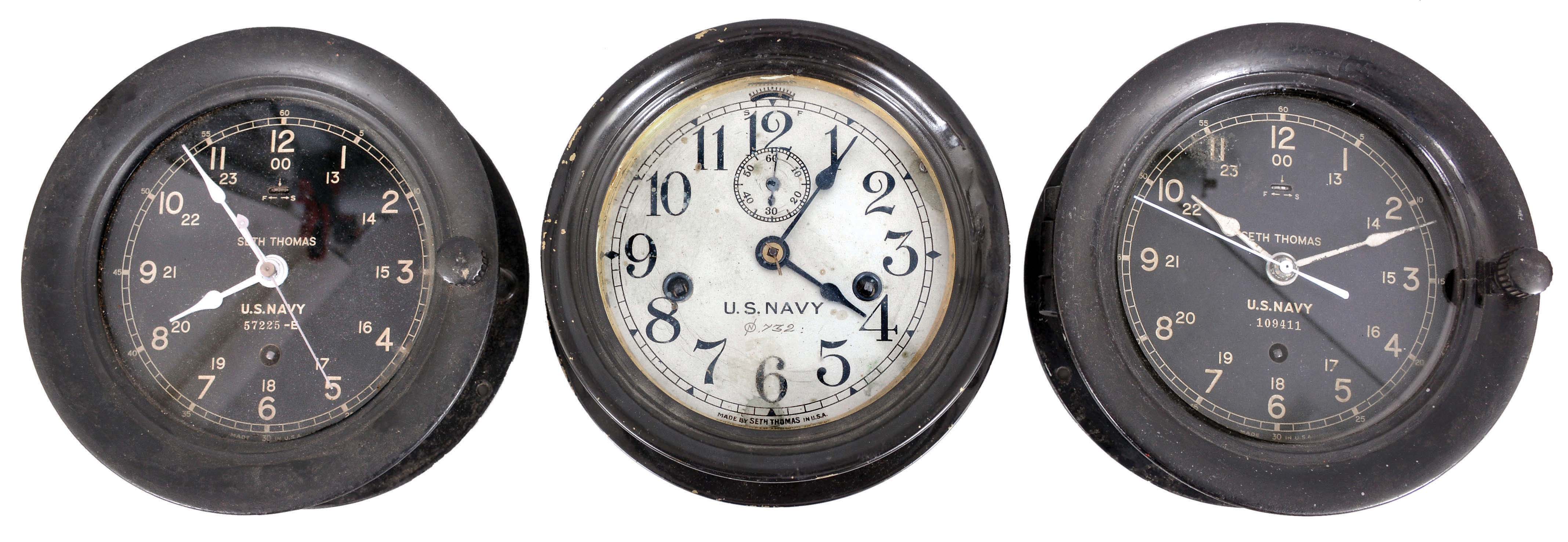 Clocks- 3 (Three) Seth Thomas Marine: (1) Seth Thomas, Thomaston, Conn., for U.S. Navy, "Ship's Lever" wardroom timepiece, 8 day, time only, spring-driven balance wheel movement with center seconds in a black phenolic case with hinged bezel, serial number 57225-E; (2) Seth Thomas, Thomaston, Conn., for U.S. Navy, "Ship's Lever" wardroom timepiece, 8 day, time only, spring-driven balance wheel movement with center seconds in a black phenolic case with hinged bezel, serial number 109411; (3) Seth Thomas, Thomaston, Conn., for U.S. Navy, "Engine Lever" wardroom timepiece, 8 day, time only, twin spring-driven balance wheel movement brass case painted black with hinged bezel. — Antique Clocks Price Guide