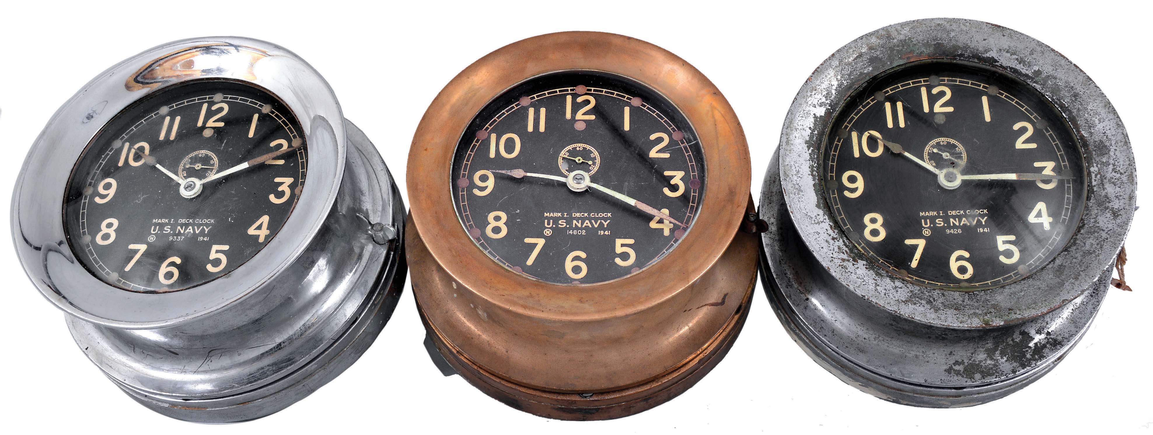 Clocks- 3 (Three) Chelsea Deck: Chelsea Clock Co., Boston, Mass., for U.S. Navy, "Mark I- Deck Clock", 8 day, time only, spring-driven balance wheel rear-wind movments, two in nickel plated cases and one in a brass case, 5.5 inch black dials with white hands and numerals, subsidiary seconds. — Antique Clocks Price Guide