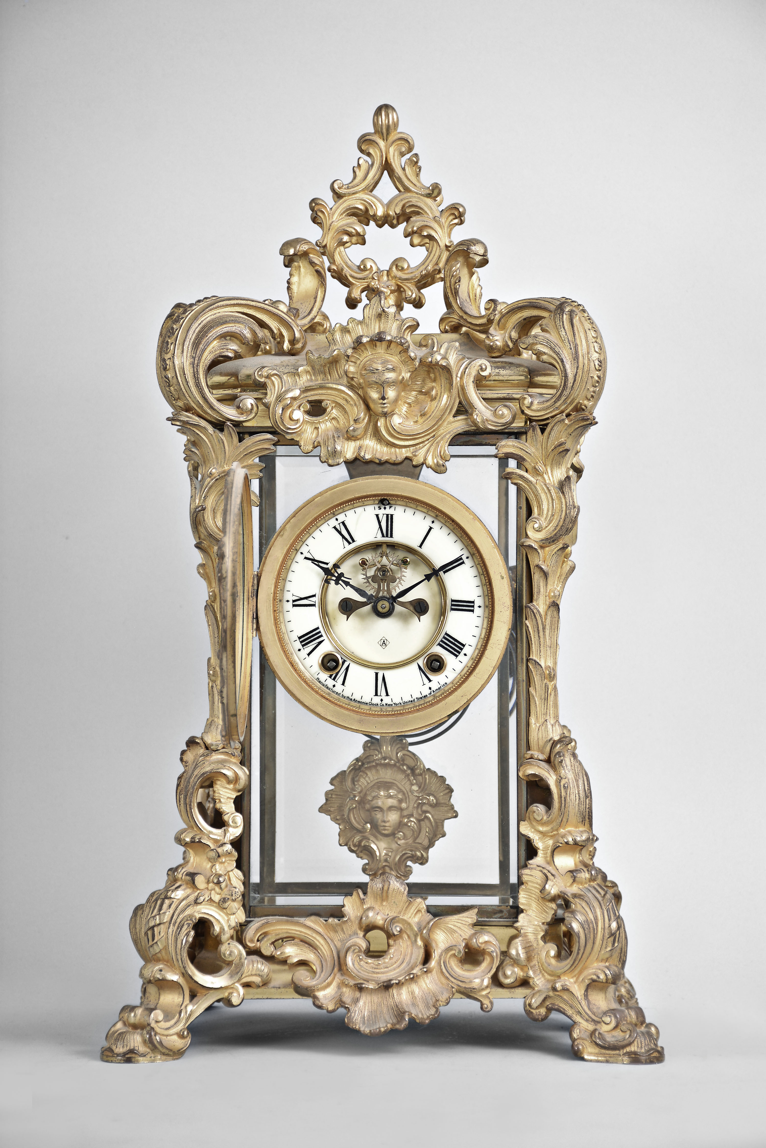 Ansonia Clock Co., New York, "Regal", 8 day, time and strike, spring driven brass movement crystal regulator mantel clock with visible escapement. — Antique Clocks Price Guide