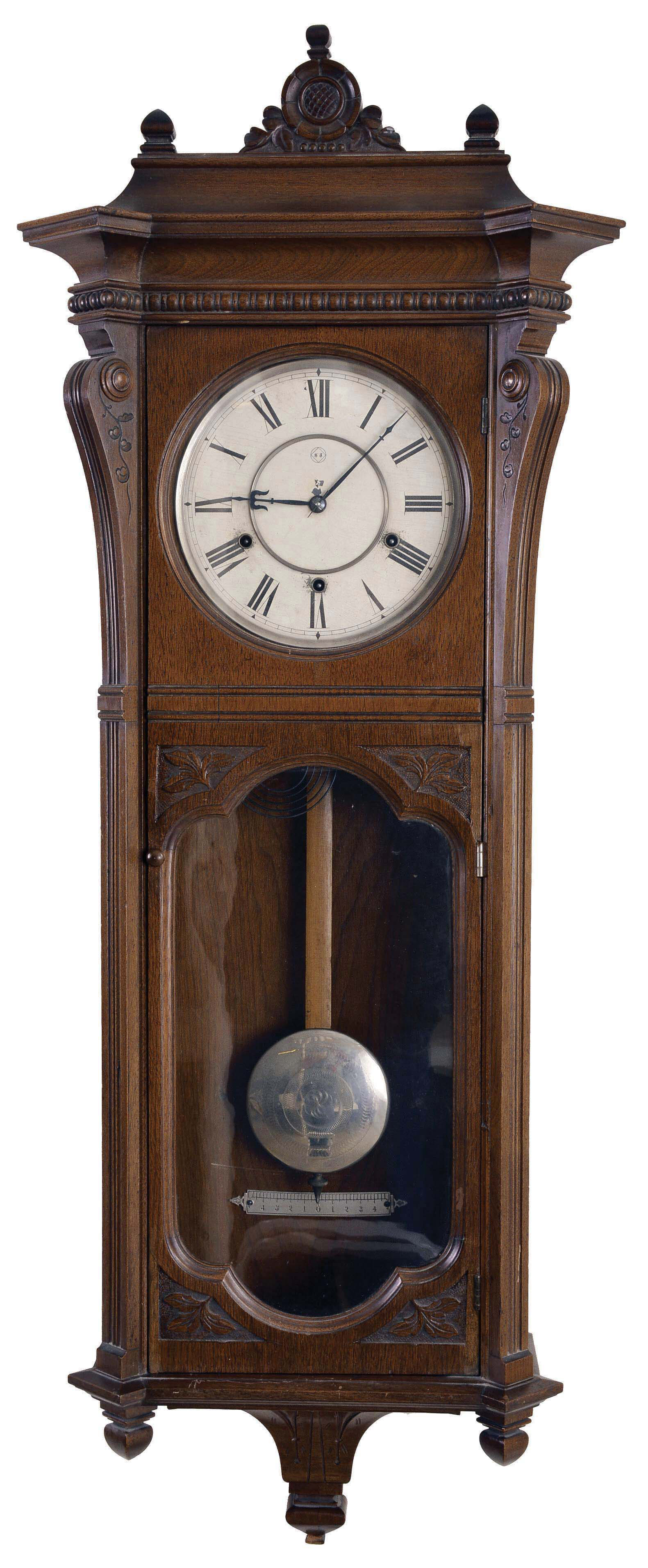 Seth Thomas Clock Co., Thomaston, Conn., "Marcy", wall clock, 8 day, time and quarter strike, spring driven movement in a walnut case with a painted metal dial and damascened nickel pendulum bob — Antique Clocks Price Guide