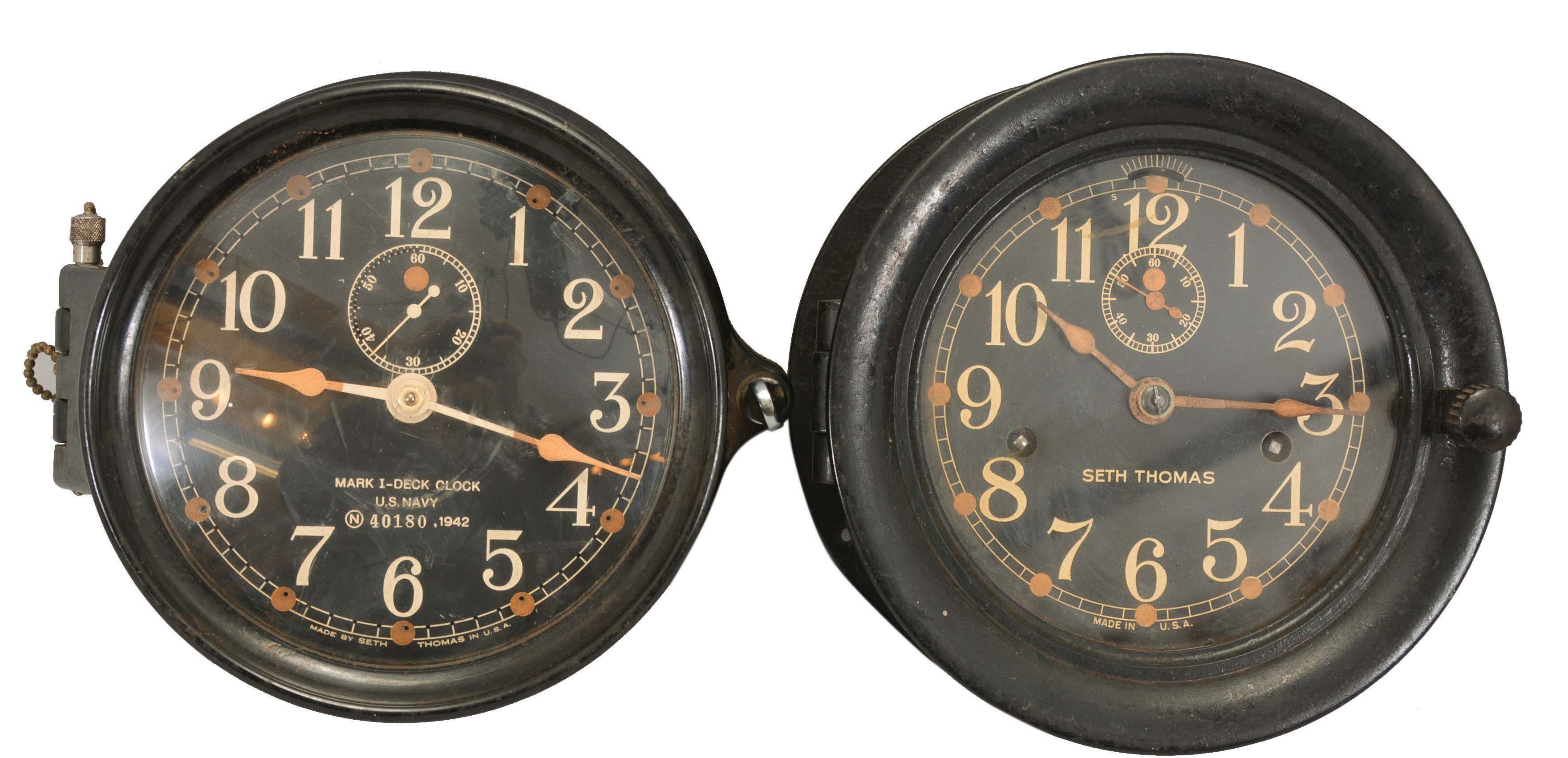 Clocks- 2 (Two) Seth Thomas Marine: (1) Seth Thomas Clock Co., Thomaston, Conn., for U.S. Navy, "Mark I- Deck Clock", 8 day, time only, spring-driven rear-wind movement in a black phenolic case with a hinged bezel, 6 inch black dial with white Arabic numerals, subsidiary seconds, and white spade hands, dated 1942. (2) Seth Thomas Clock Co., Thomaston, Conn., deck clock, 8 day, time only, twin spring-driven movement in a black phenolic case with a hinged bezel, 6 inch black dial with white Arabic numerals, subsidiary seconds, and white spade hands. — Antique Clocks Price Guide