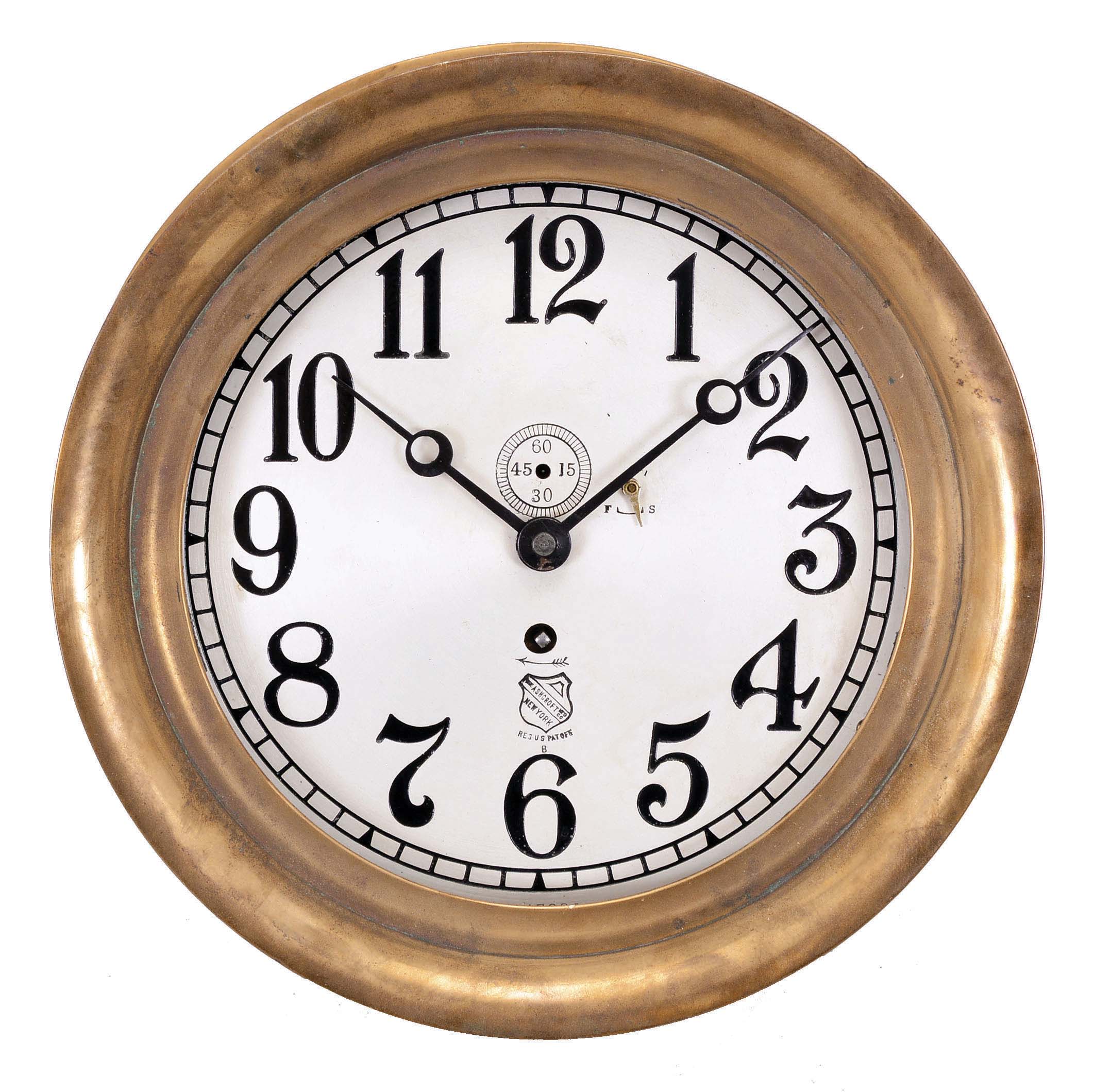 Chelsea Clock Co., Boston, Mass., for The Ashcroft Mfg. Co., New York, engine room clock, 8 day, time only, spring-driven jeweled balance wheel movement in a red brass case with hinged bezel, 8 inch silvered dial with Arabic numerals, subsidiary seconds, and black steel Breguet style hands, movement serial number 167712. — Antique Clocks Price Guide