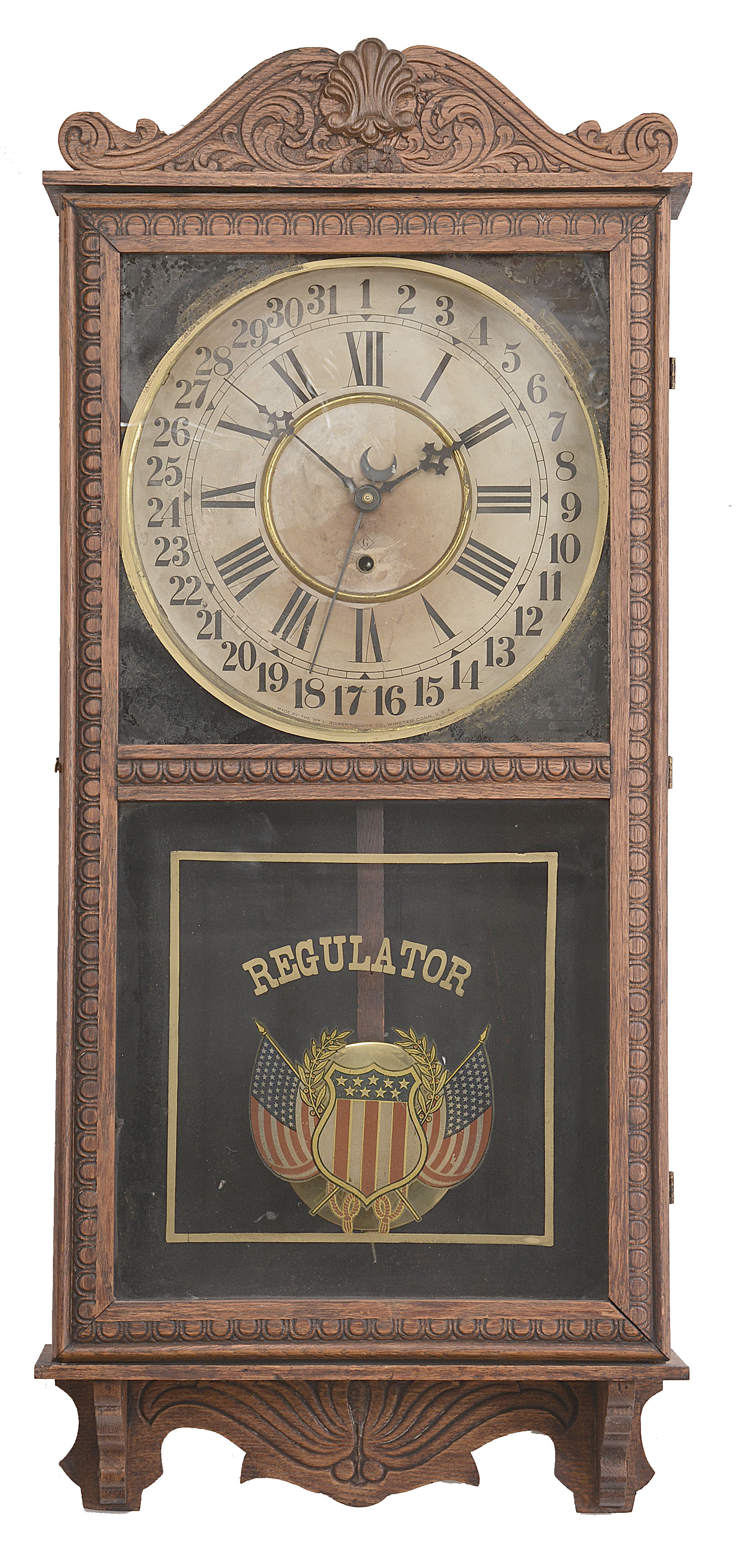 Clocks- 2 (Two): (1) William L. Gilbert, Winsted, Conn., "Observatory" hanging clock, 8 day time and simple calendar, spring driven movement in an oak case, c1913; (2) E. Ingraham, Bristol, Conn., "Yankee Clipper" banjo clock, 8 day, time and strike, spring driven movement in a wood case with nautical theme, c1934. — Antique Clocks Price Guide