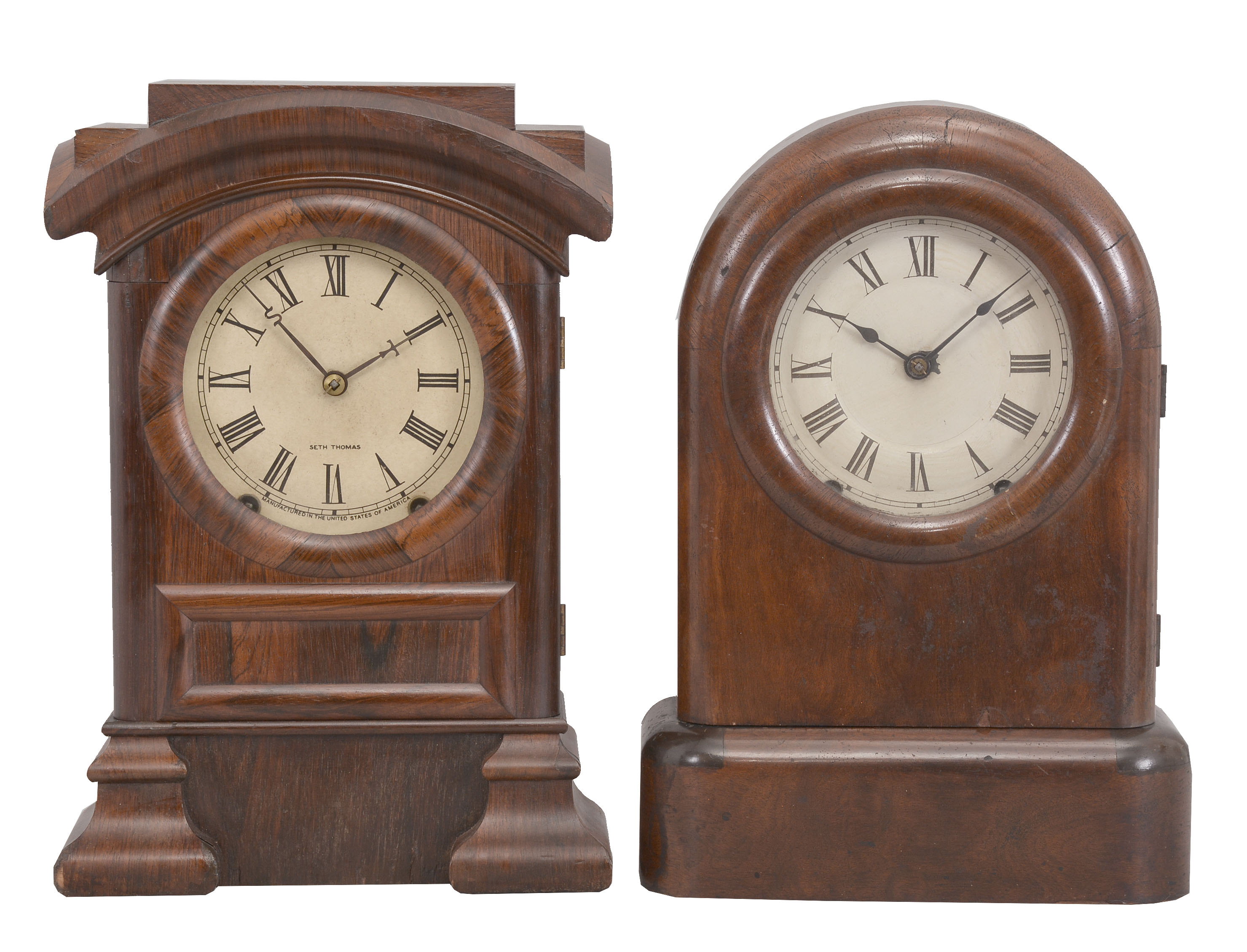 Clocks- 3 (Three): (1) Seth Thomas Clock Co., Thomaston, Conn., "Arch Top" mantel clock, 8 day, time and strike, spring driven movement in a rosewood veneered case, c1880; (2) Seth Thomas Clock Co., Thomaston, Conn., "Tudor No. 1" cottage clock, 8 day, time and strike, spring driven movement in a walnut veneer case, c1879. (3) Ansonia Clock Co., NY, mantel clock, 8 day, time and strike, spring driven movement with visible escapement in a shelf form case made of walnut and walnut veneer with painted panels, c1920. — Antique Clocks Price Guide