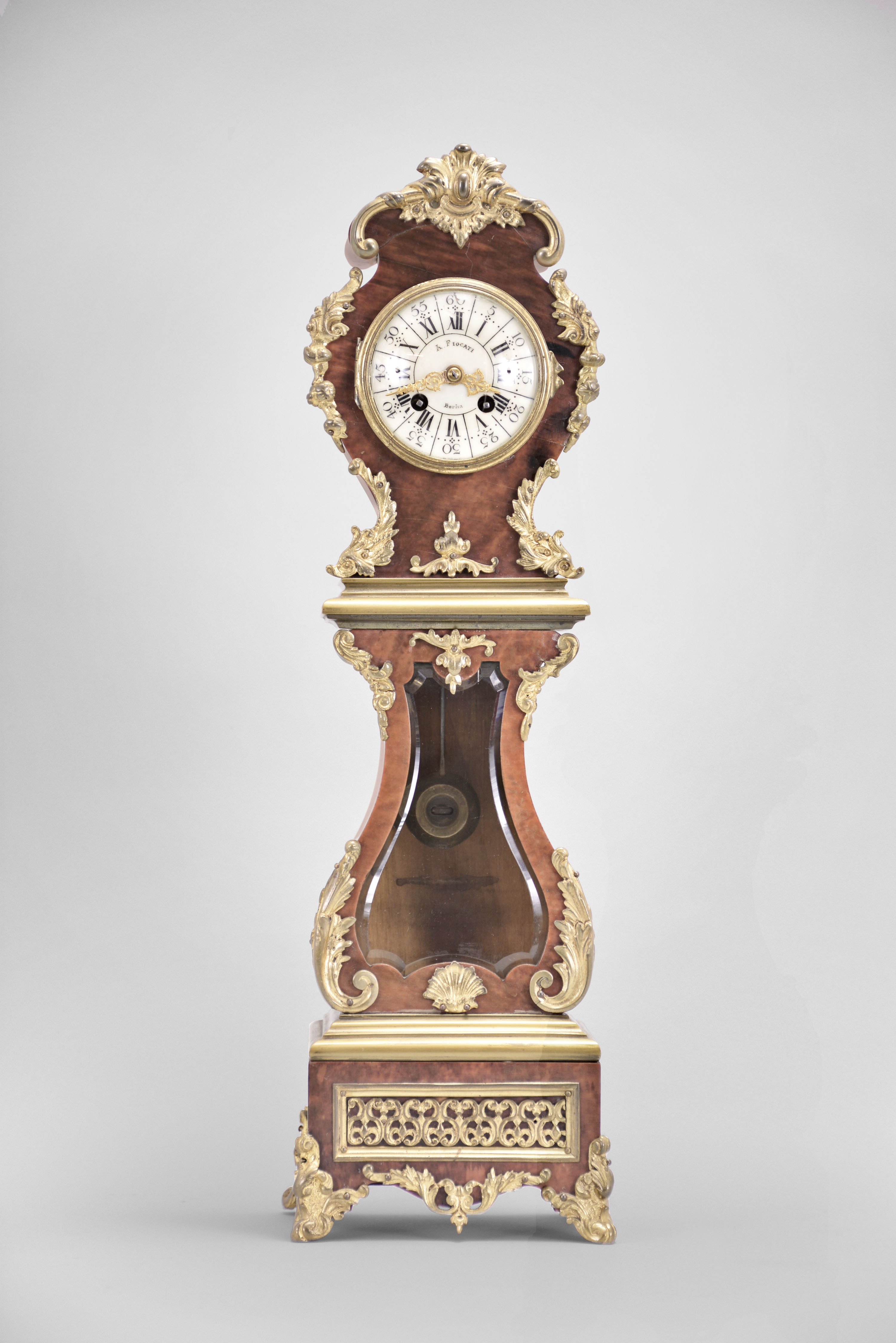 Vincenti & Cie, Paris, France for A. Fiocati, Berlin, Germany, miniature tall clock, 8 day, time and strike, spring driven diminutive pendule de Paris movement in a lyre-form case with tortoise shell veneer and applied ormolu mounts, cream colored enamel dial with Roman and Arabic numerals, and gilt Louis XV style hands. — Antique Clocks Price Guide