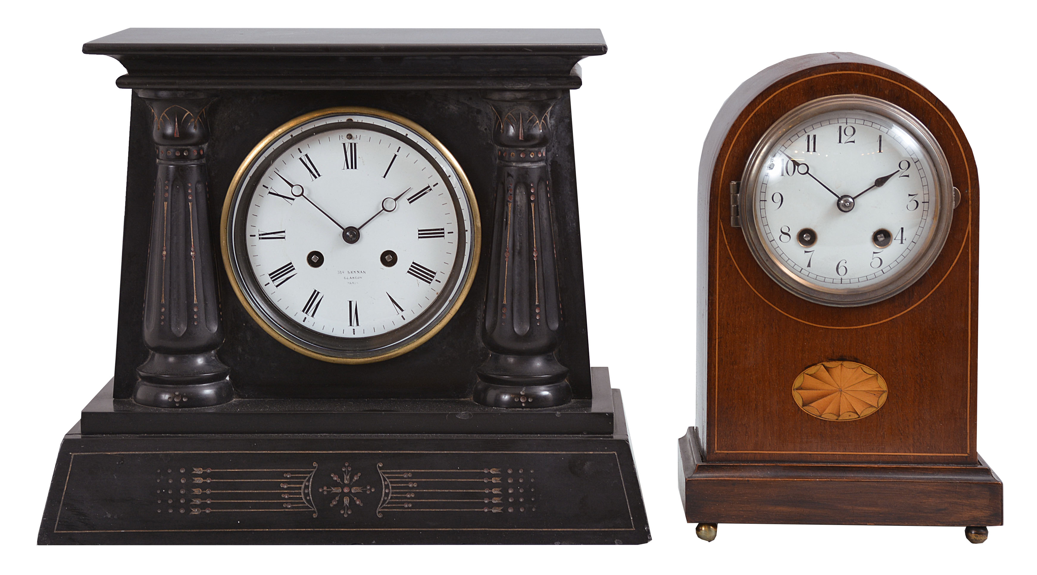 Clocks- 2 (Two): (1) Vincenti & Cie., Paris, mantel clock, 8 day, time and strike, spring driven pendule de Paris movement in a black slate case with Egyptian-style columns, c1880; (2) France, round top mantel clock, 8 day, time and strike, spring driven pendule de Paris movement in a walnut case with inlay, c1910. — Antique Clocks Price Guide