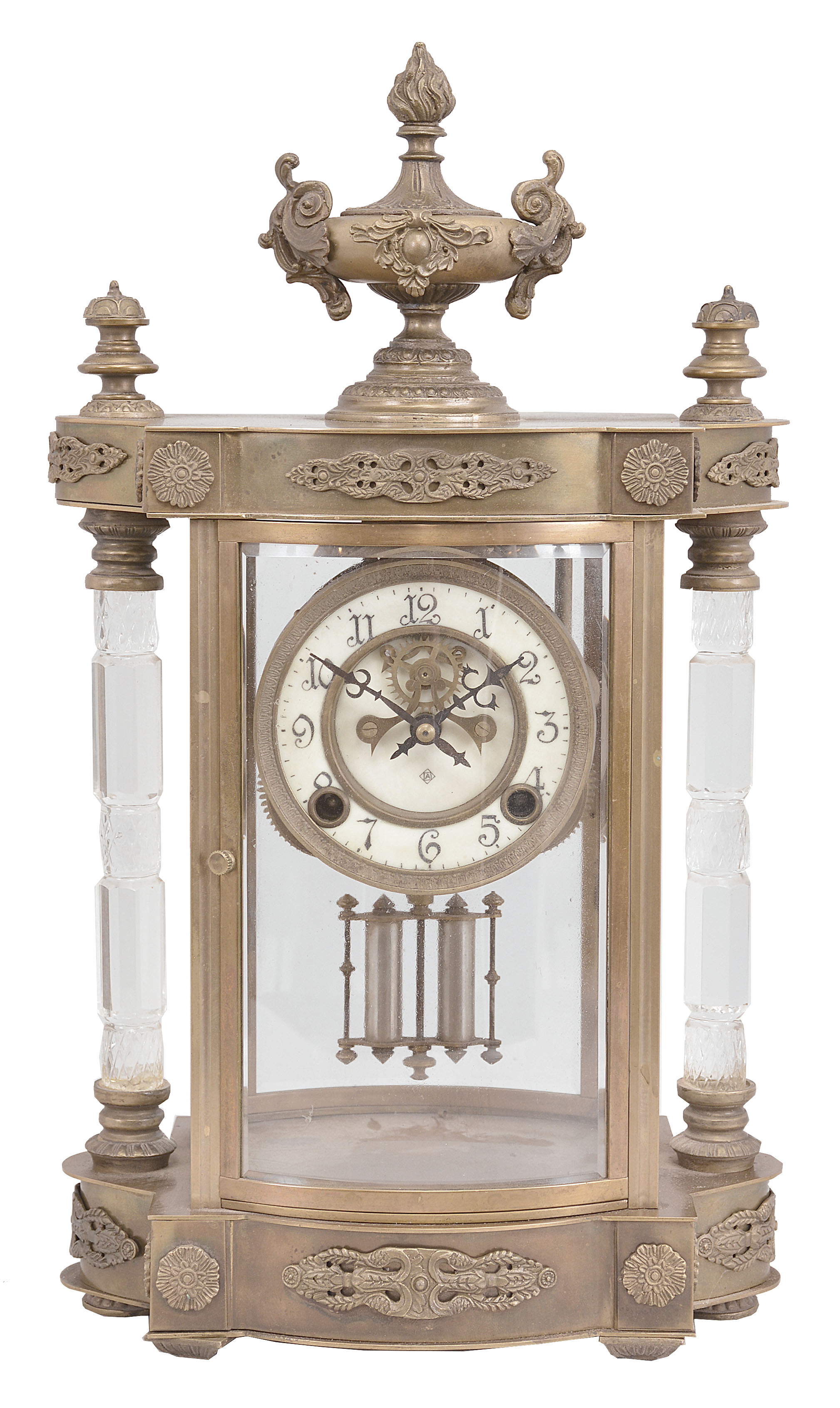 Reproduction Ansonia Clock Co., "Jupiter" crystal regulator, 8 day, time and strike, spring driven movement with visible Brocot escapement in a glazed brass case flanked by cut glass columns, two-piece white porcelain dial with blued steel hands, all surmounted by an urn finial. — Antique Clocks Price Guide