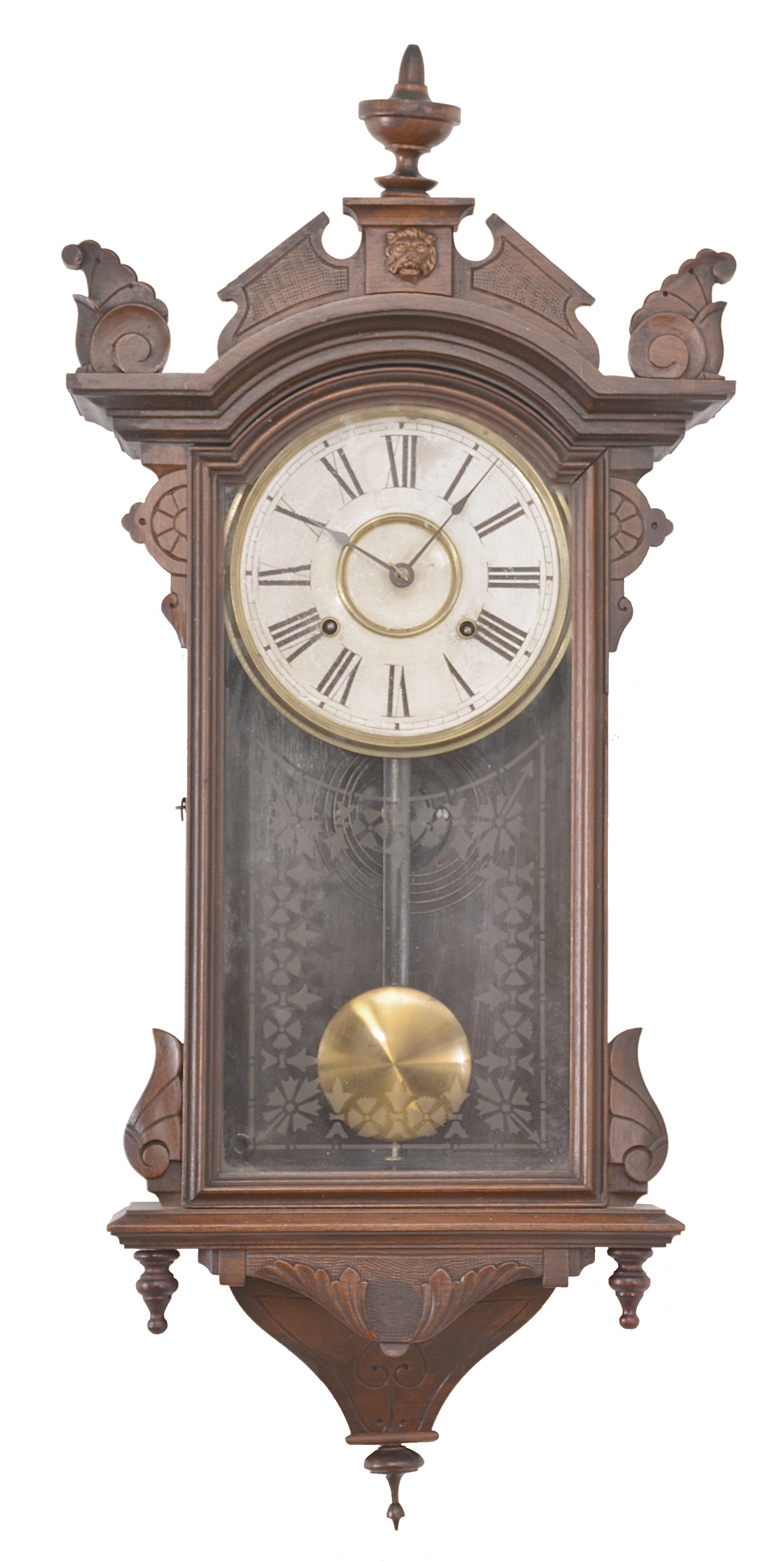 Clocks- 2 (Two): (1) E. N. Welch, Forestville, Conn., wall clock, 8 day, time only, spring driven movement in an ash case with walnut burl accent and painted metal dial, c1890; (2) E. N. Welch, Forestville, Conn., wall clock, 8 day, time and strike, spring driven movement in a walnut case with carved elements, c1880. — Antique Clocks Price Guide