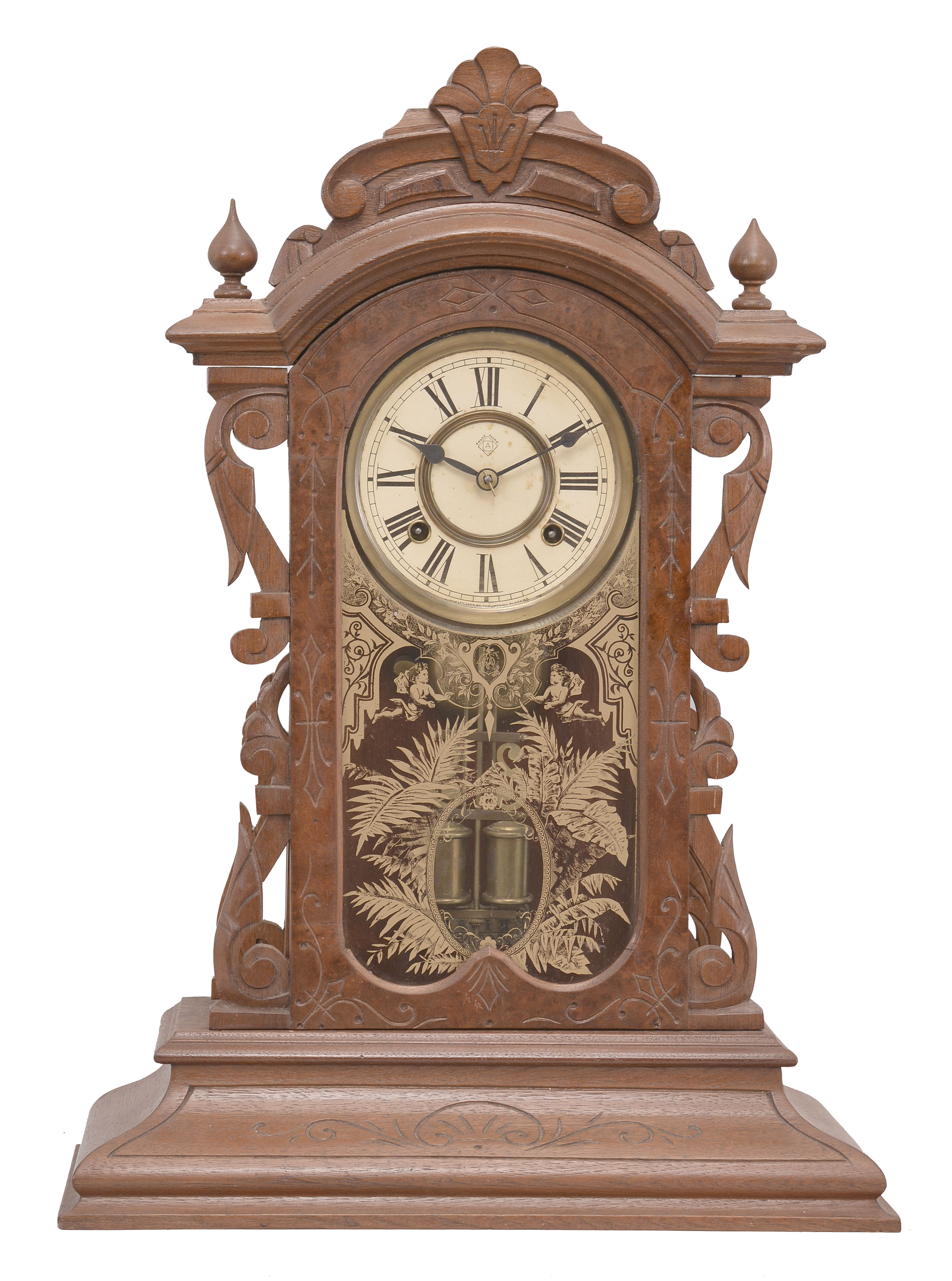 Ansonia Clock Co., New York, NY, "Broadway" shelf clock, 8 day, time and strike, spring driven movement in a walnut and burled walnut veneer case with carved elements. — Antique Clocks Price Guide