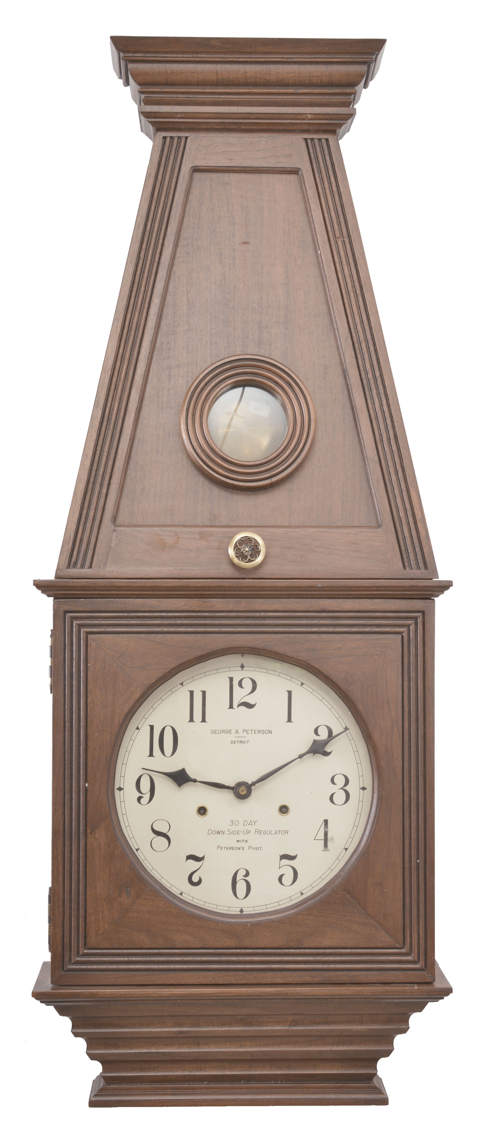 Clocks- 2 (Two): (1) George A. Peterson, Detroit, Michigan, "Down Side-Up Regulator", 30 day, time only, twin spring movement with novel compound crutch touted as "Peterson's Pivot" in a walnut case with painted metal dial, dated 1970. (2) Simplex Time Recorder Co., Gardner, Mass., unknown model, 8 day, time recorder, twin spring driven movement in a dark oak and oak veneer case, c1920. — Antique Clocks Price Guide