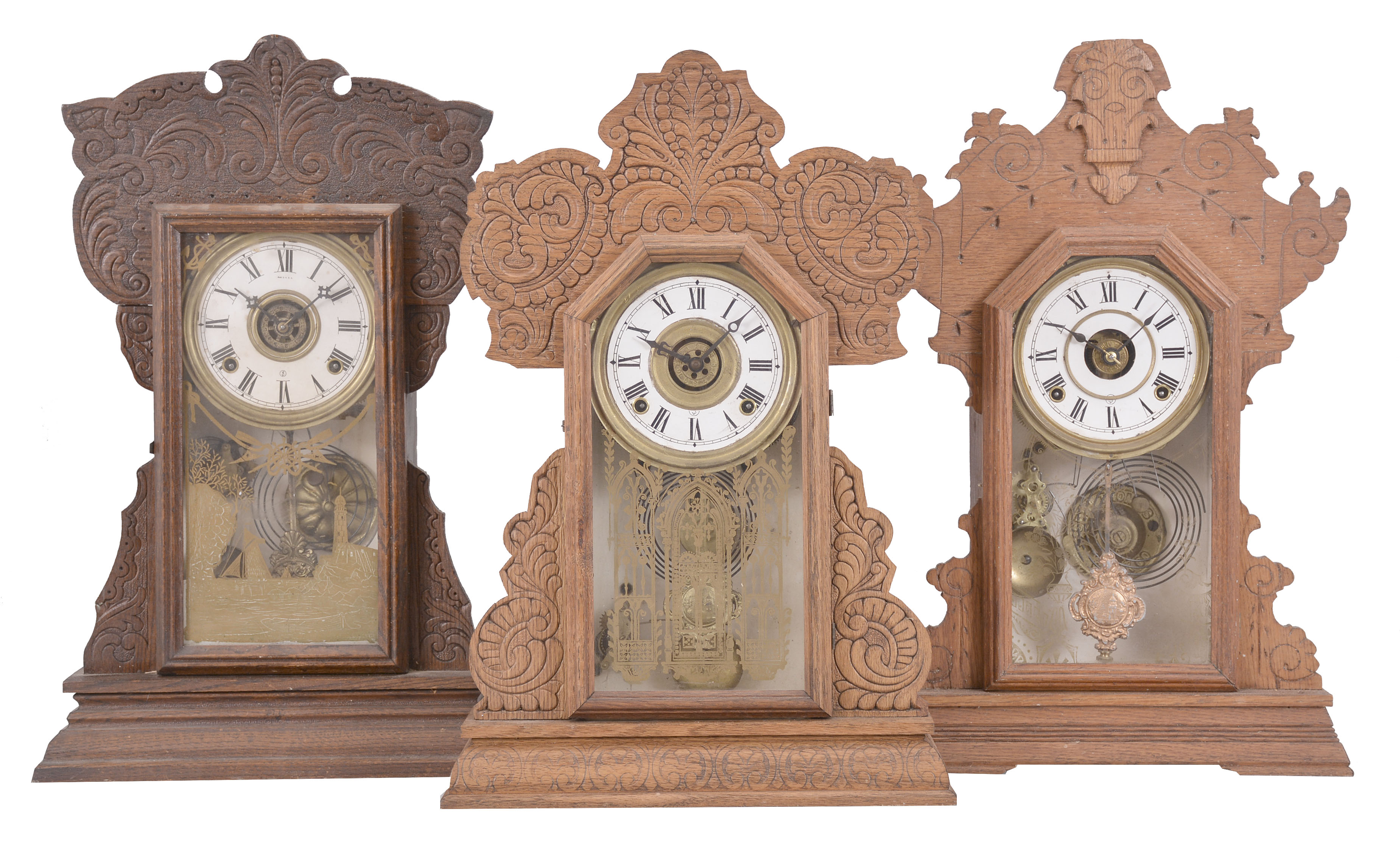 Clocks- 5 (Five) mantel, time and strike with alarm, spring driven movements: (1) Wm. L. Gilbert Clock Co., "Capitol No. 43" mantel, 8 day movement in an oak case, c1904; (2) E. Ingraham, "Cuyuga", 8 day movement in an oak case, c1915; (3) Seth Thomas Clock Co., "Yale", 8 day movement in an oak case, c1909; (4) Waterbury Clock Co., "Suffolk", 8 day movement in a walnut case, 1891; (5) Seth Thomas Clock Co., unknown model, 30 hour in a rosewood veneer case, c1890. — Antique Clocks Price Guide