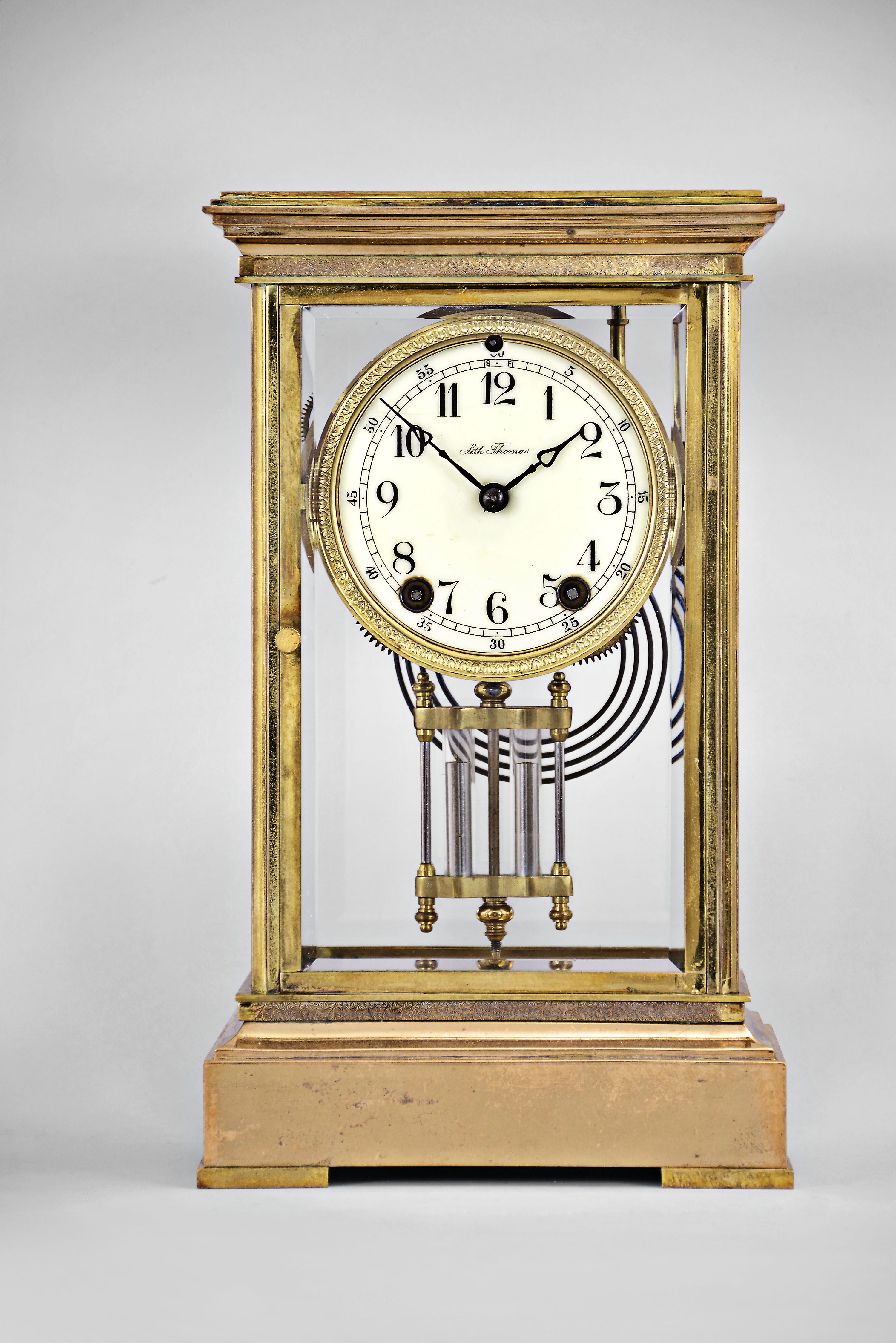 Seth Thomas Clock Co., Thomaston, Conn., "Empire No. 2", 8 day, time and strike spring brass movement crystal regulator mantel clock. — Antique Clocks Price Guide