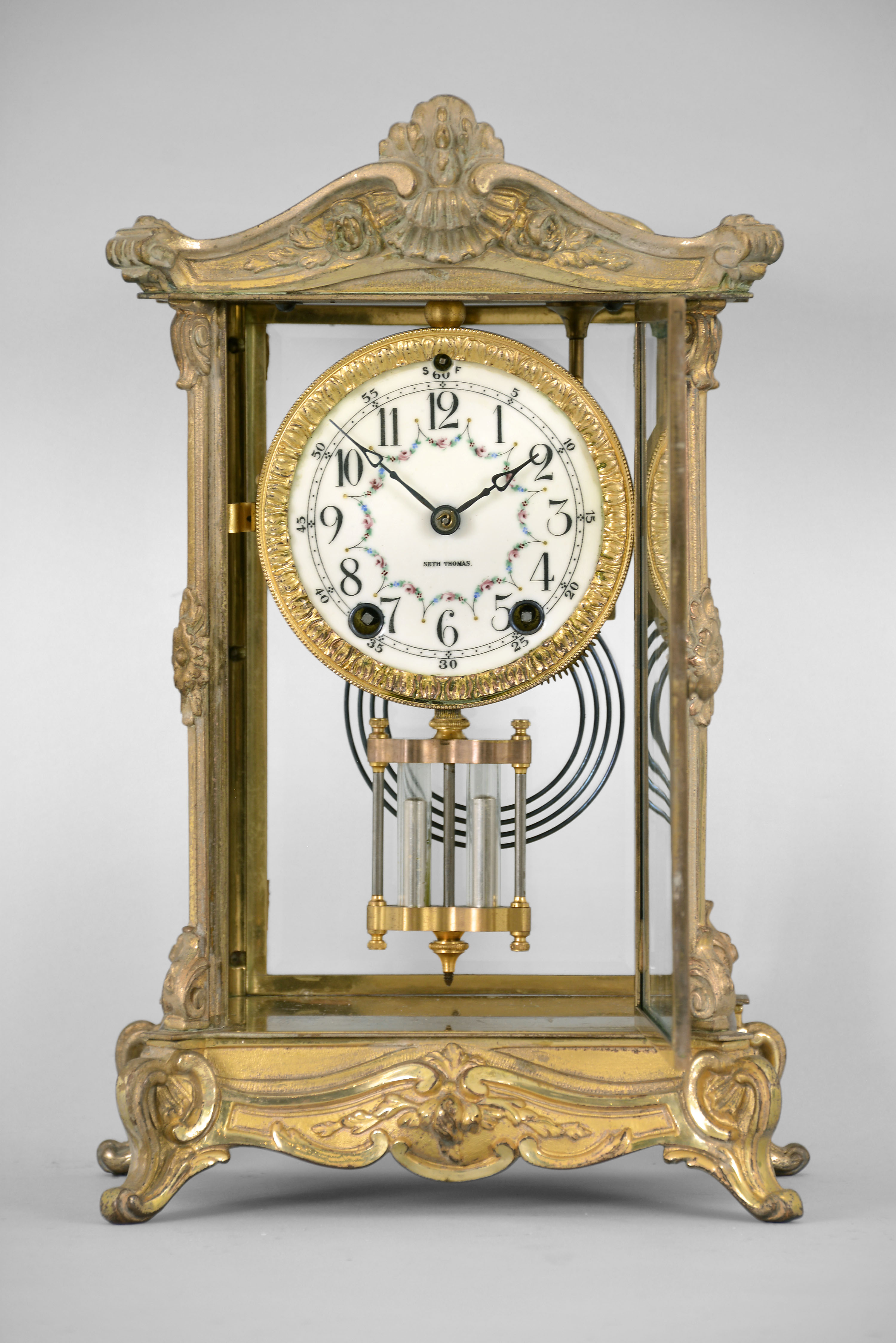 Seth Thomas Clock Co., Thomaston, Conn., "Empire No. 9", 8 day, time and strike spring brass movement crystal regulator mantel clock. — Antique Clocks Price Guide