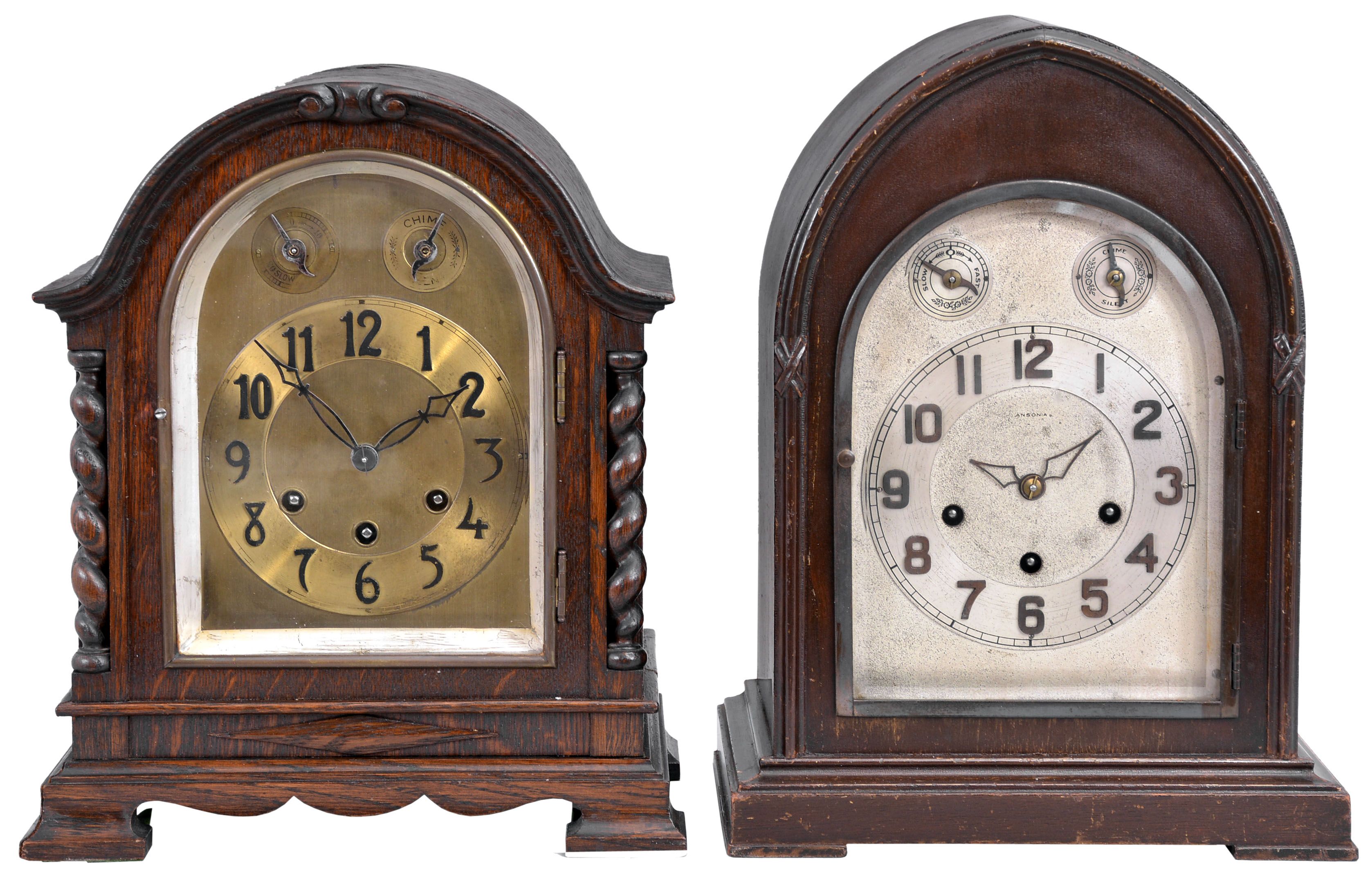 Clocks- 2 (Two) Chiming Mantel: (1) Ansonia Clock Co., New York, "Sonia No. 4" chiming mantel clock, 8 day, time and strike with Westminster chime in a lancet walnut case with silvered dial, c1925; (2) Gustav Becker, Germany, chiming mantel clock, 8 day, time and strike with Westminster chime, spring driven movement in an arch top oak case with barley twist columns, c1900. — Antique Clocks Price Guide