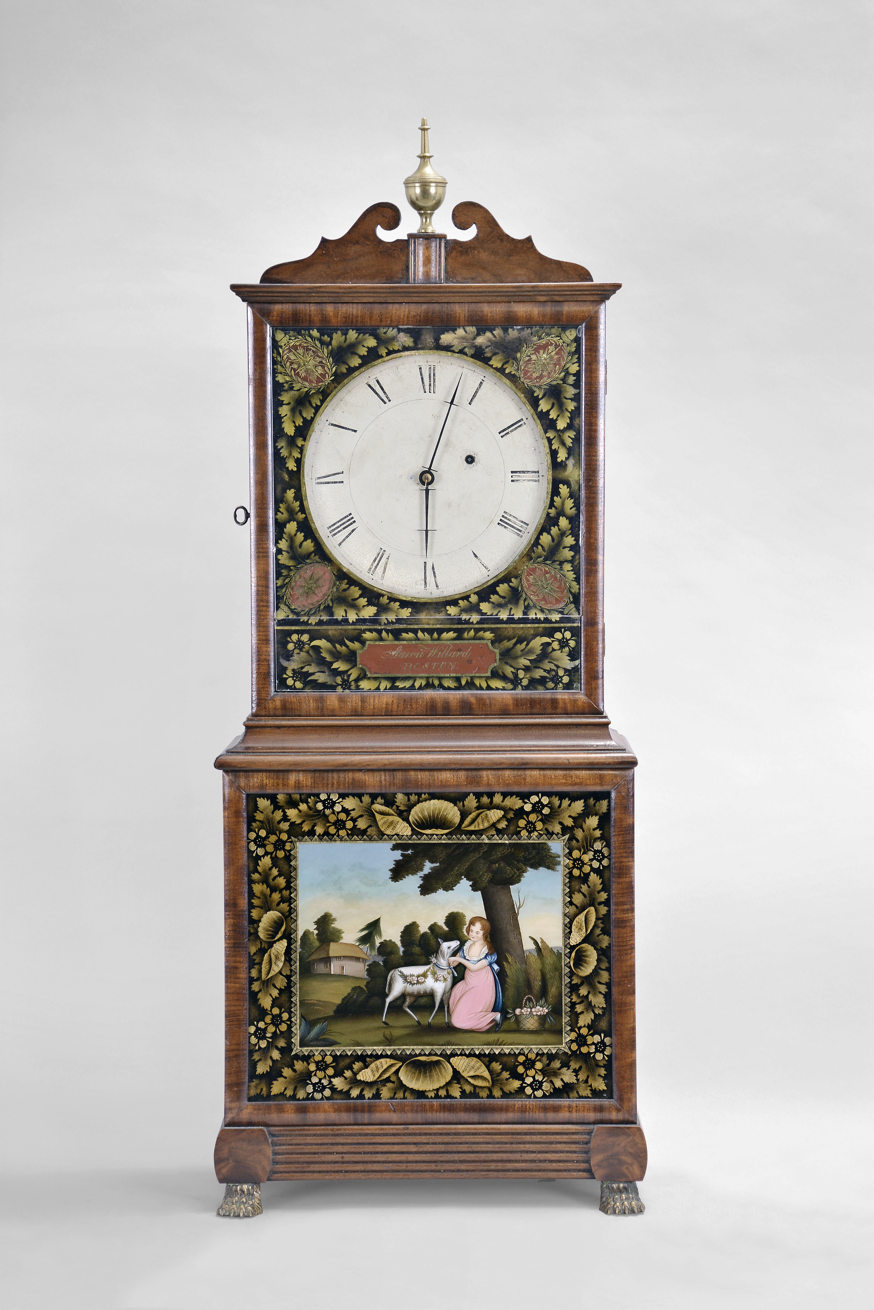 Aaron Willard, Boston, Massachusetts shelf clock, 8 day, time only, weight driven movement in a mahogany case with painted metal dish dial with reverse painted upper and lower tablets surmounted by brass finial and resting on cast brass hairy paw feet — Antique Clocks Price Guide