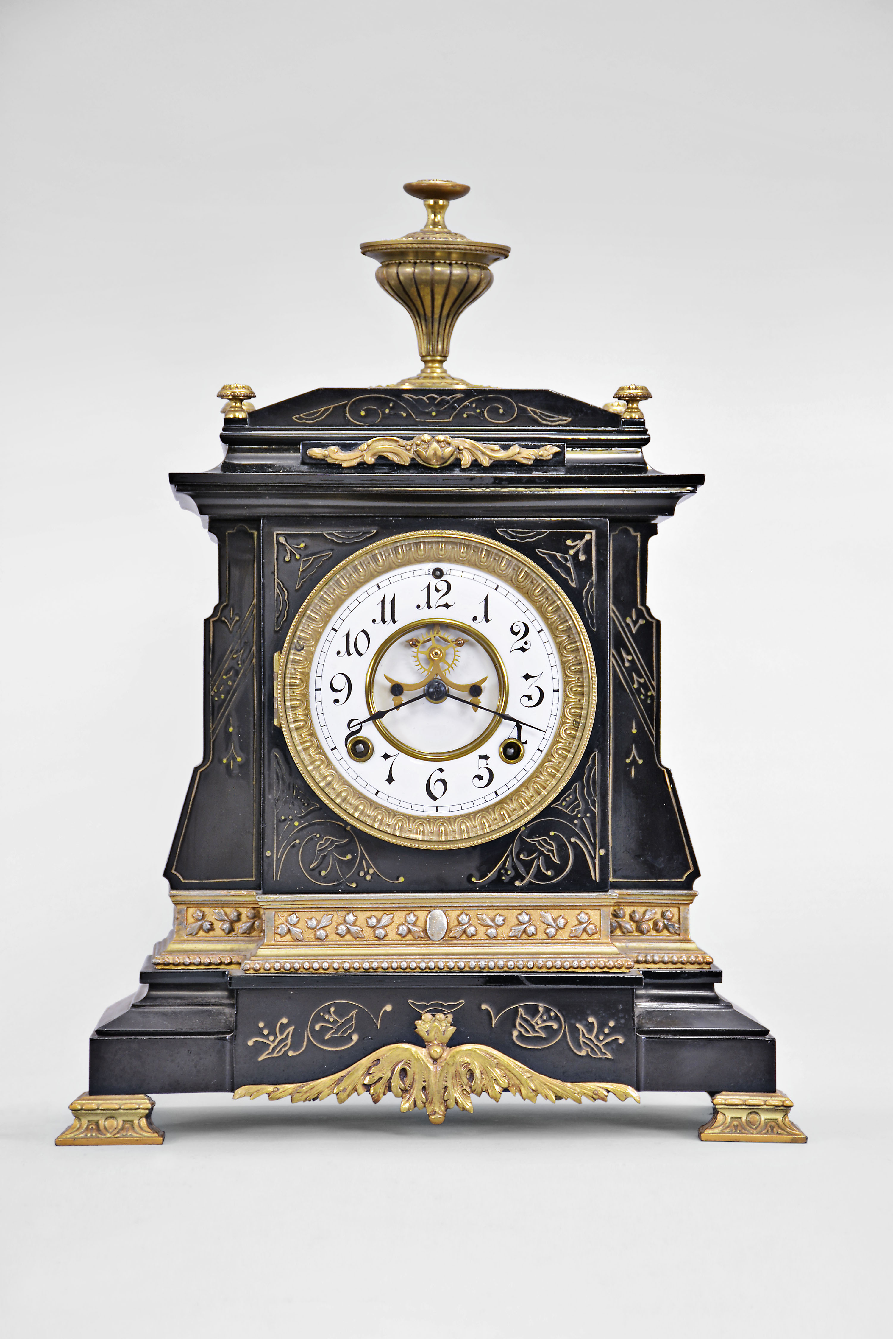 Ansonia Clock Co., New York, 8 day, time and strike spring brass movement enameled iron case mantel clock. We could not find this model in the catalog. — Antique Clocks Price Guide