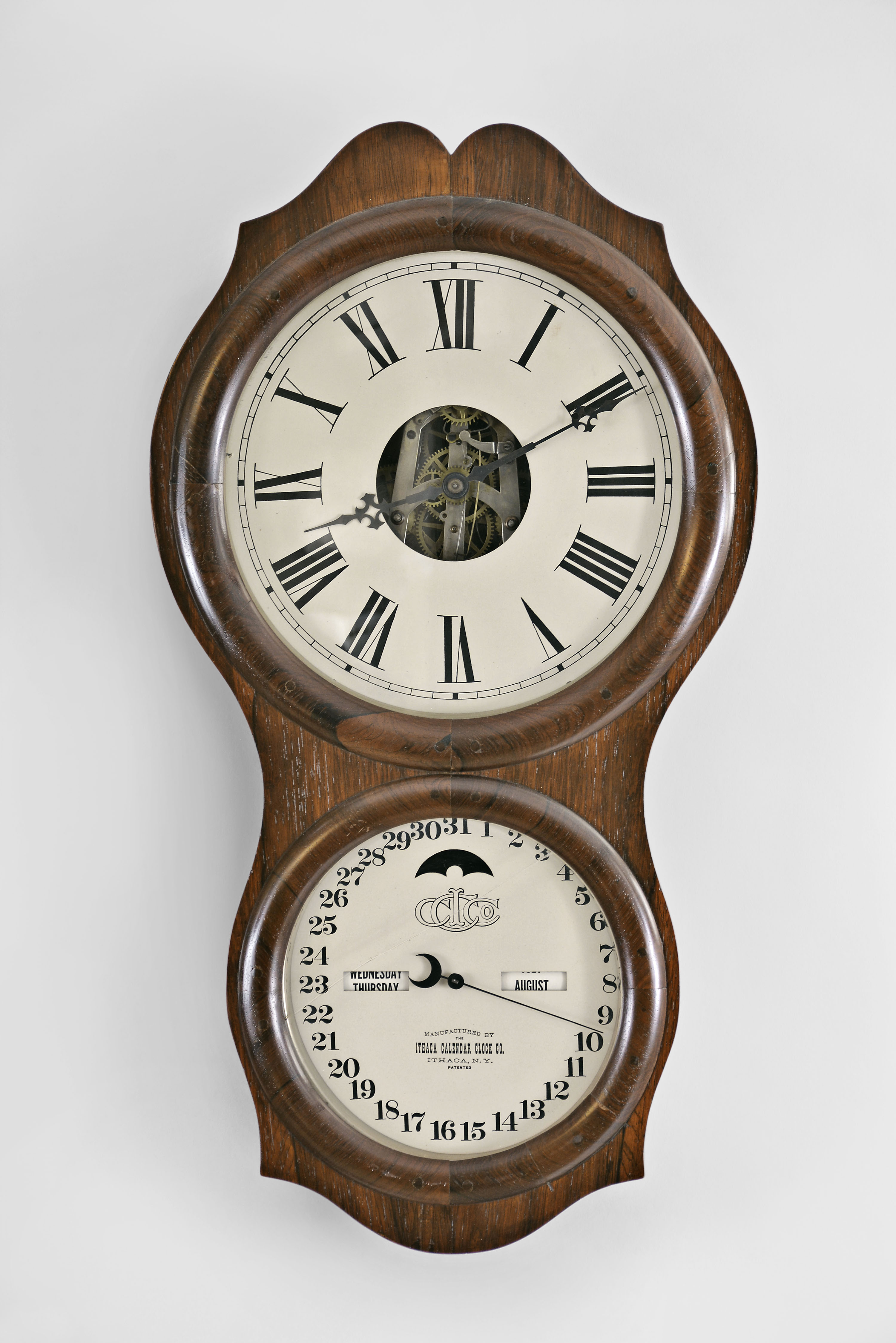 Ithaca Calendar Clock Co., Ithaca, New York, "Office No. 4", 30 day, spring brass movement double dial calendar wall timepiece. — Antique Clocks Price Guide