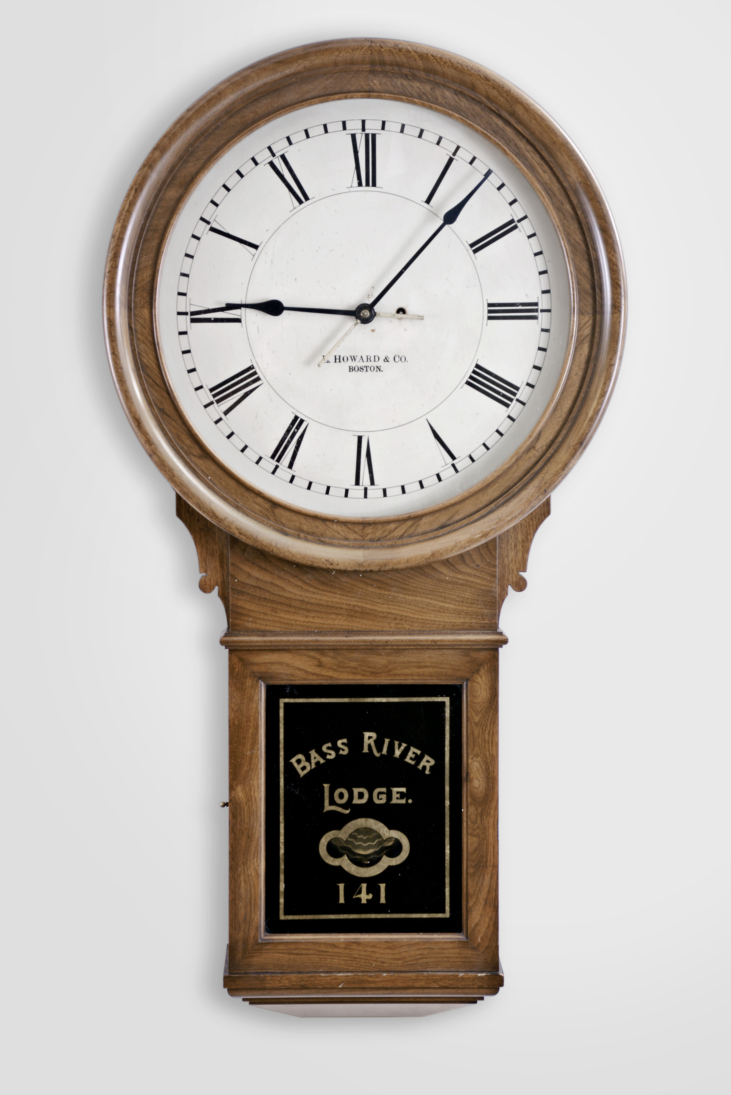 E. Howard & Co., Boston, Mass., "No. 70 Regulator - 20 Inch Dial", wall clock, 8 days, time only, weight driven movement in a walnut case with painted wooden dial and reverse painted lower tablet for "BASS RIVER LODGE 141" — Antique Clocks Price Guide