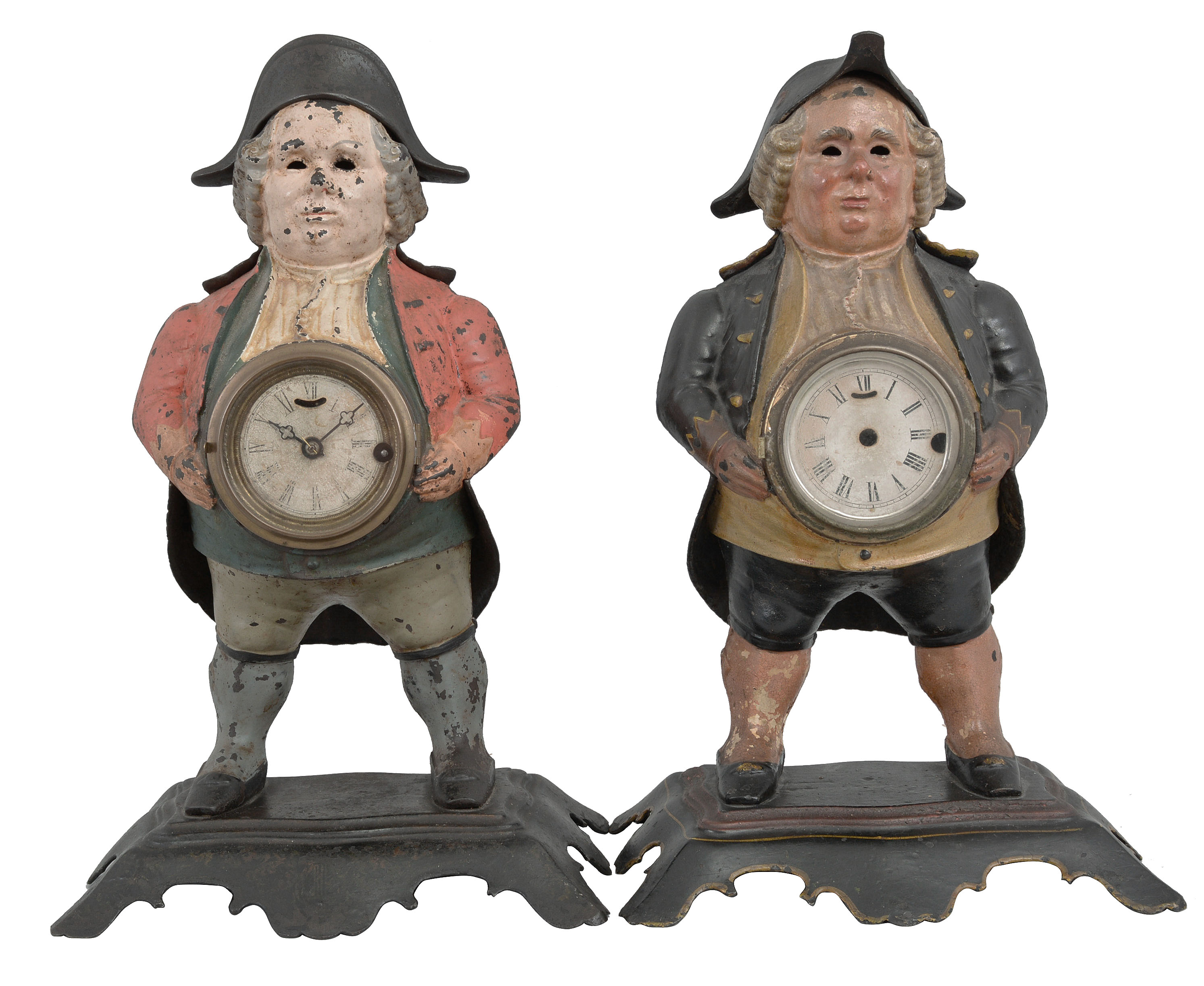 Blinking Eye Clocks- 2 (Two): (1) Bradley & Hubbard, Meriden, Conn., "Continental" blinking eye or winker clock, 30 hour, spring driven balance wheel movement in a cast iron case featuring a continental soldier in a red coat with bicorn hat, c1856; (2) Bradley & Hubbard, Meriden, Conn., "Continental" blinking eye or winker case in cast iron featuring a continental soldier with blue coat and tricorn hat, c1856. — Antique Clocks Price Guide
