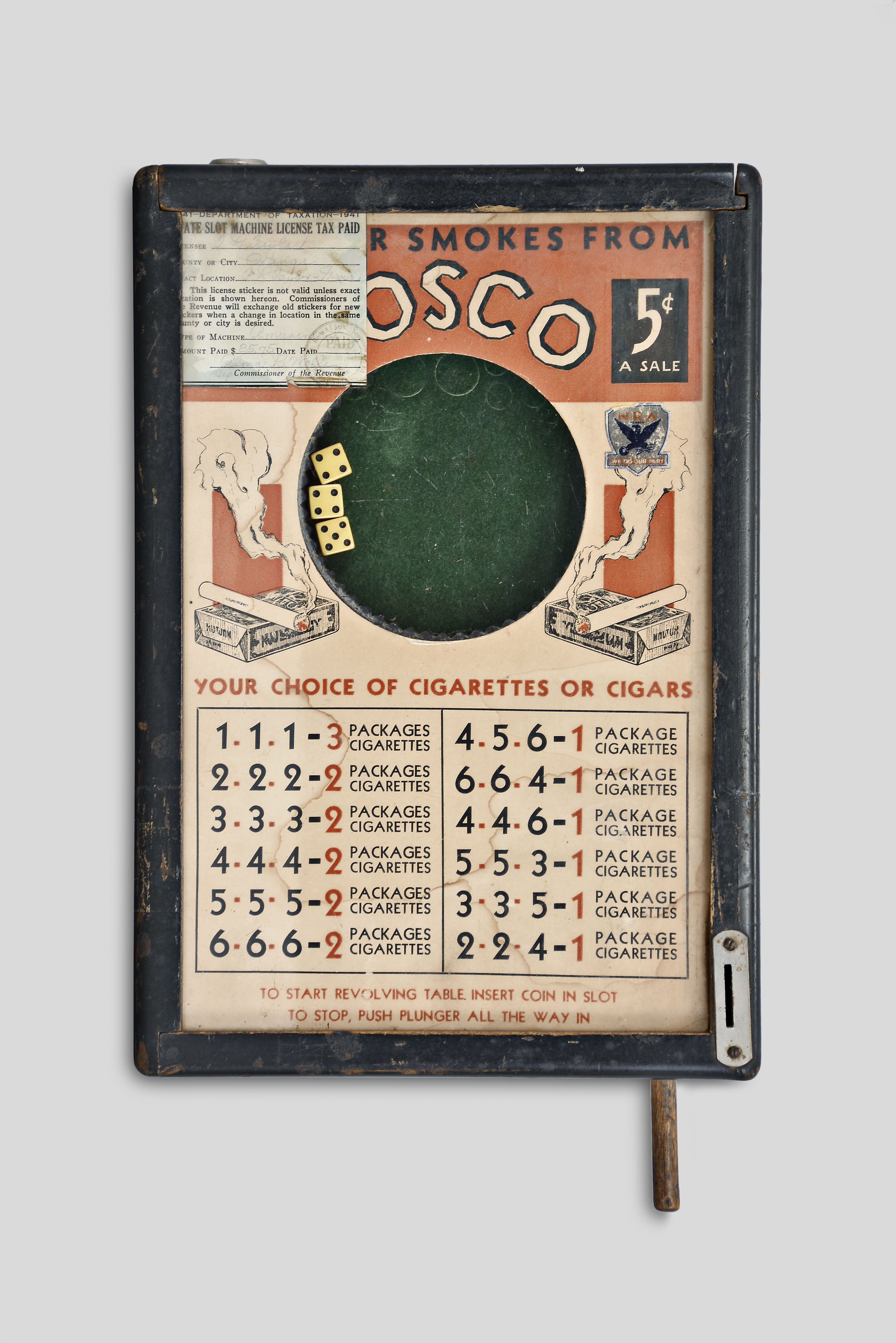 Bally Manufacturing Co., Chicago, Illinois, "Bosco" coin-operated dice trade stimulator, 110v motor powering an enclosed platform that rotates three dice with reversible payout poster featuring with beer one side and cigarettes on the other, all housed in a wood box with glass top. — Antique Clocks Price Guide