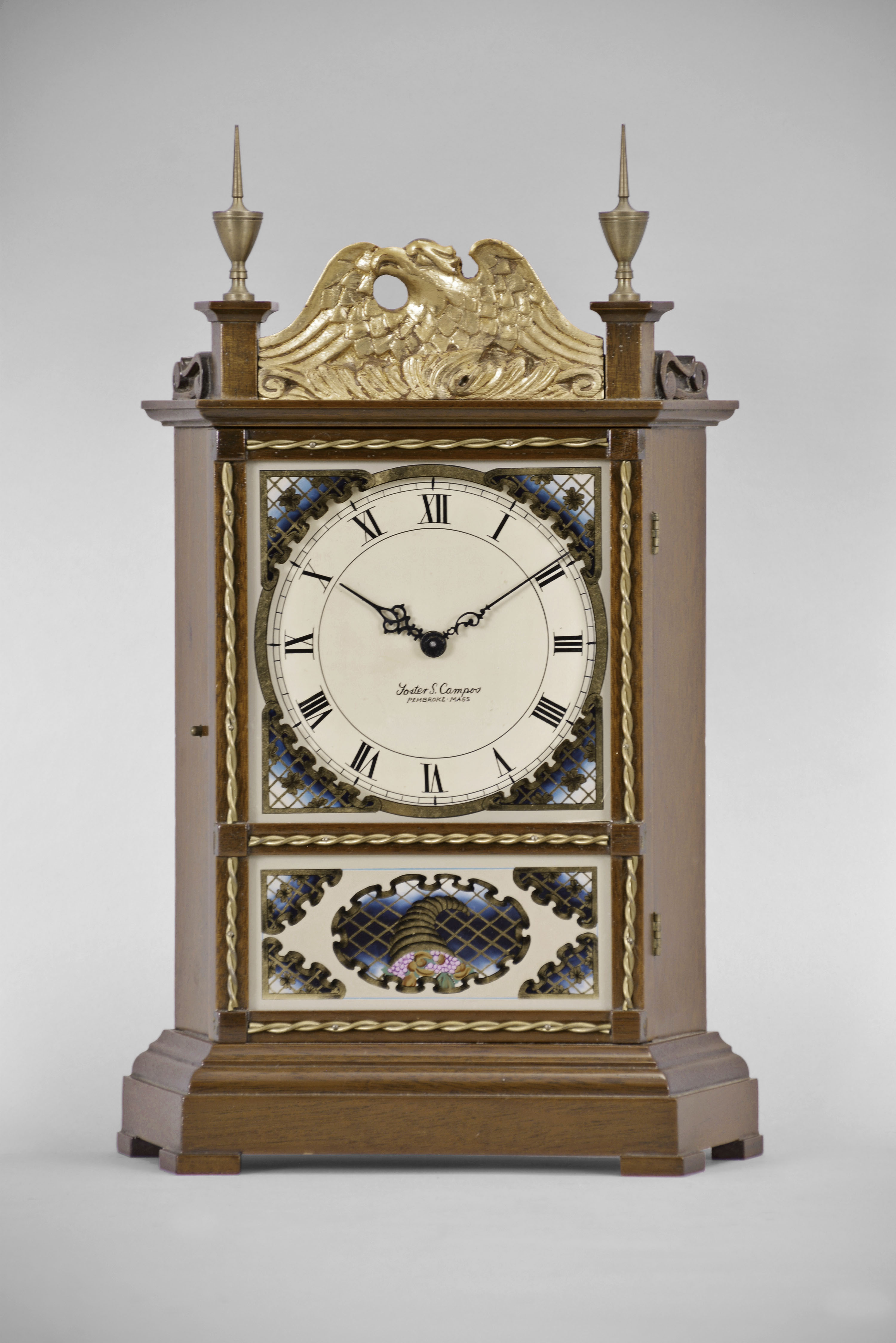 Foster Campos, Pembroke, Mass. copy of a Waltham Clock Co. version of a Miniature shelf clock with eagle splat. The original version dates about 1930. — Antique Clocks Price Guide