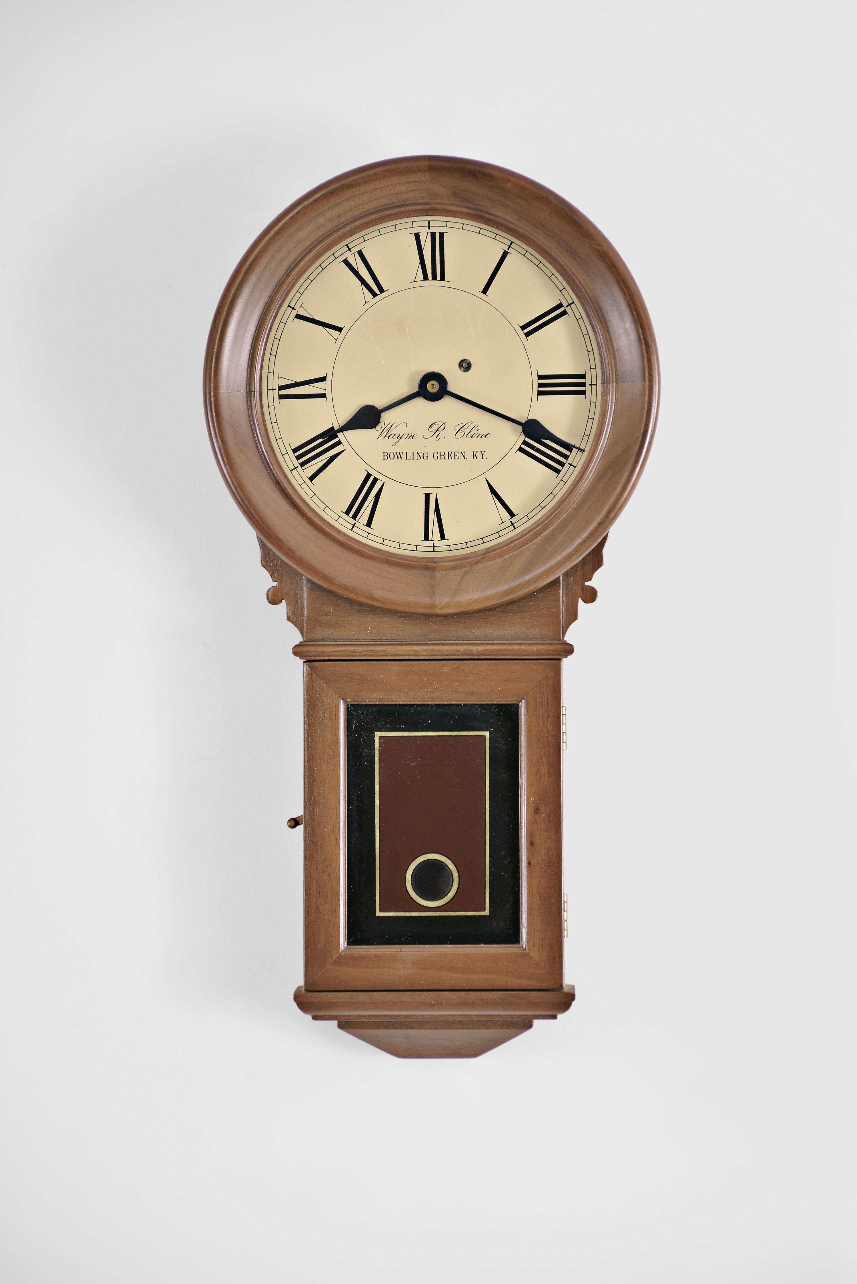 Wayne R. Cline, Bowling Green, KY, 8 day miniature replica of a Howard No. 70 wall regulator. Number C3233696 is stamped on the back of the case., The number is not stamped on the door, but based on the serial number is 32. . — Antique Clocks Price Guide