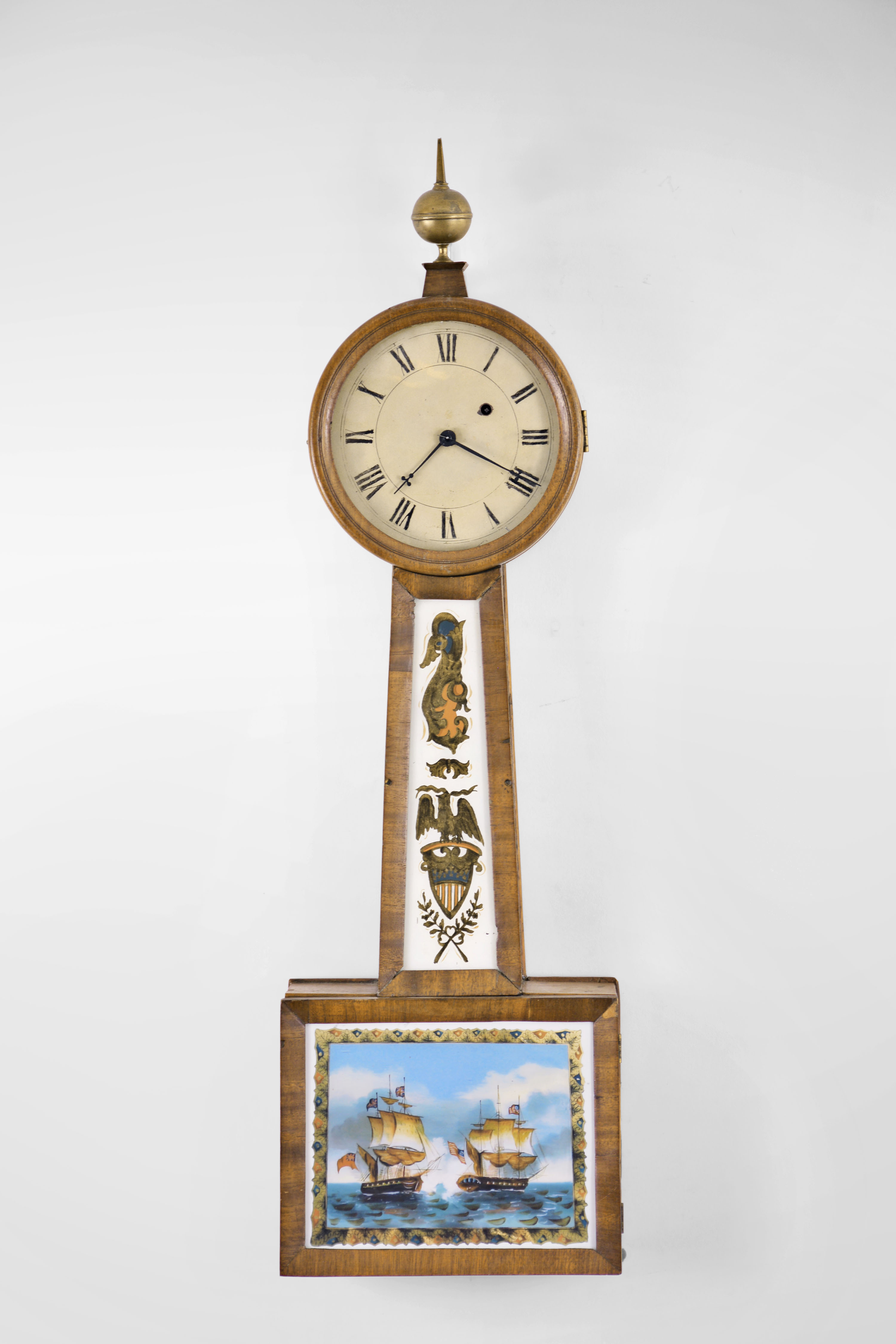 Massachusetts, Possibly a North Attleboro maker, 8 day, weight brass movement patent or banjo timepiece retailed by J. J. Beals & Son, Boston. — Antique Clocks Price Guide